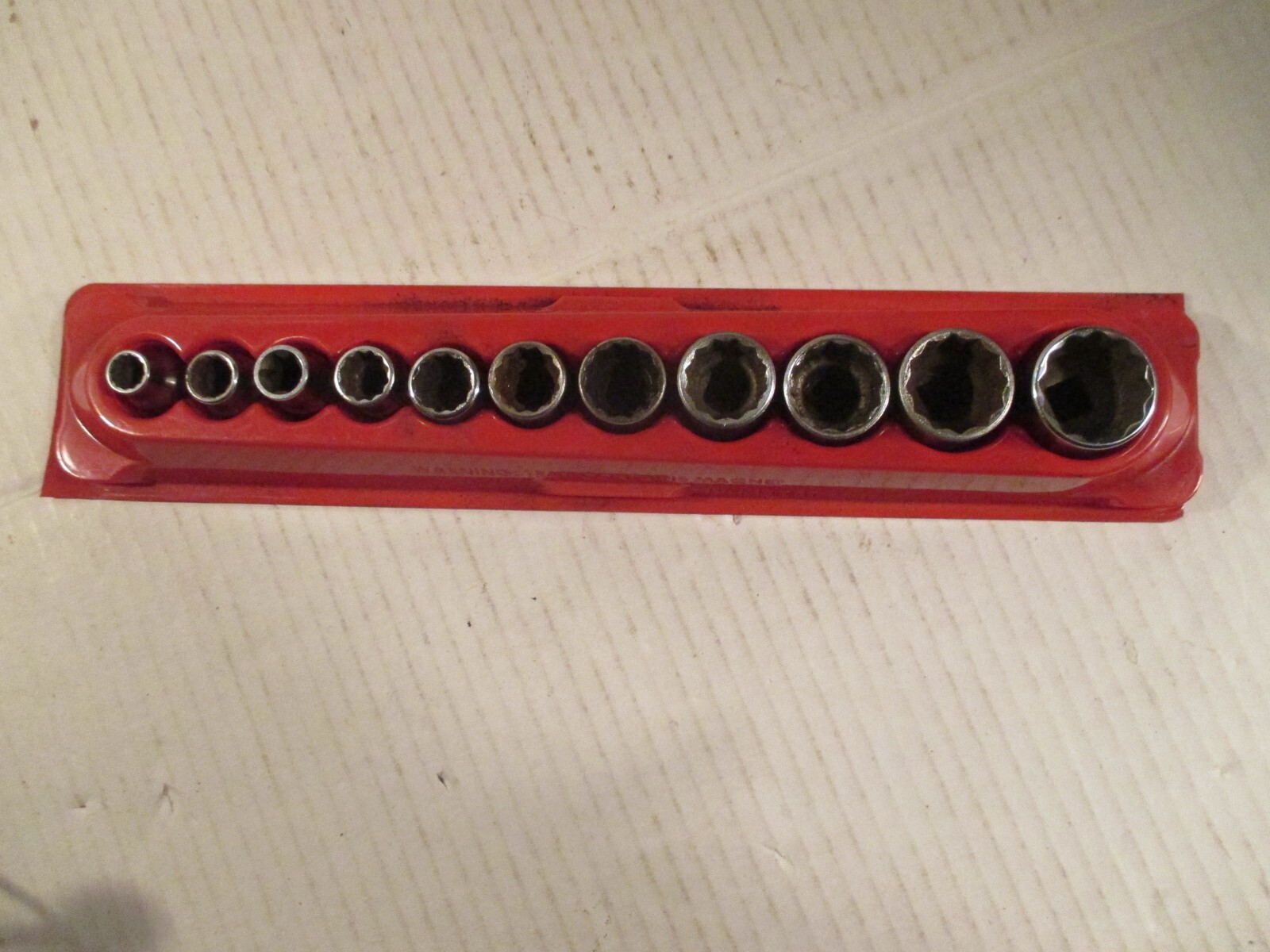 Snap on 11 piece (3/8 drive, 12 pt, 5/16 – 7/8, ) sae socket set magnet holder