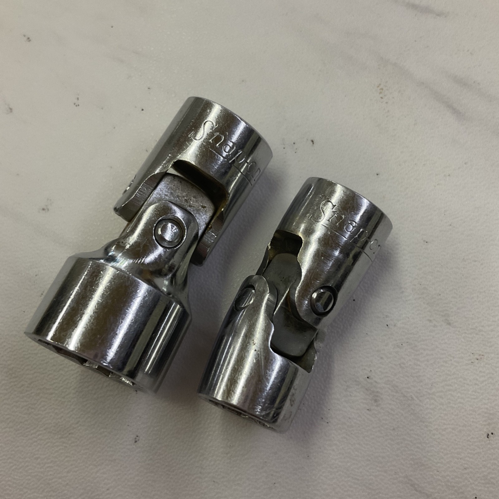 Snap-on Universal Swivel Sockets 12-Pt 3/8″ Dr USA FVU22 (11/16) & FVU14 (7/16)