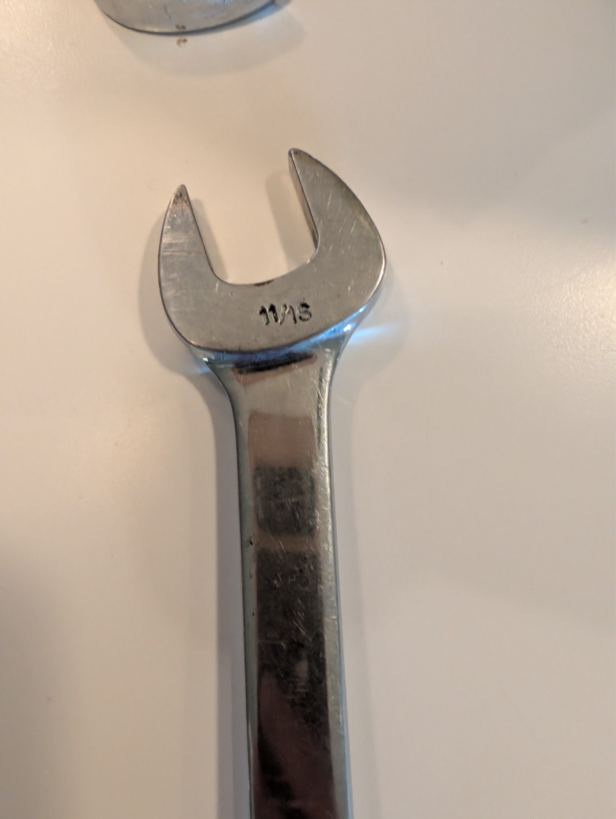 five snap-on wrenches. Four open end one swivel head. Decently well maintained