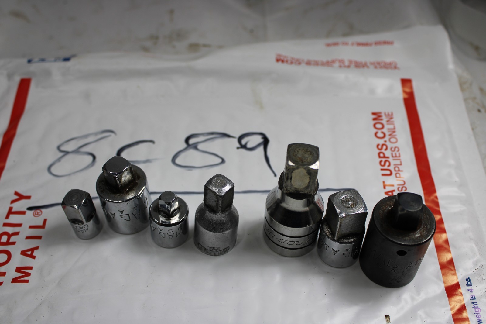 7 Piece Mac and Snap on adaptor lot 3/8 1/2 1/4