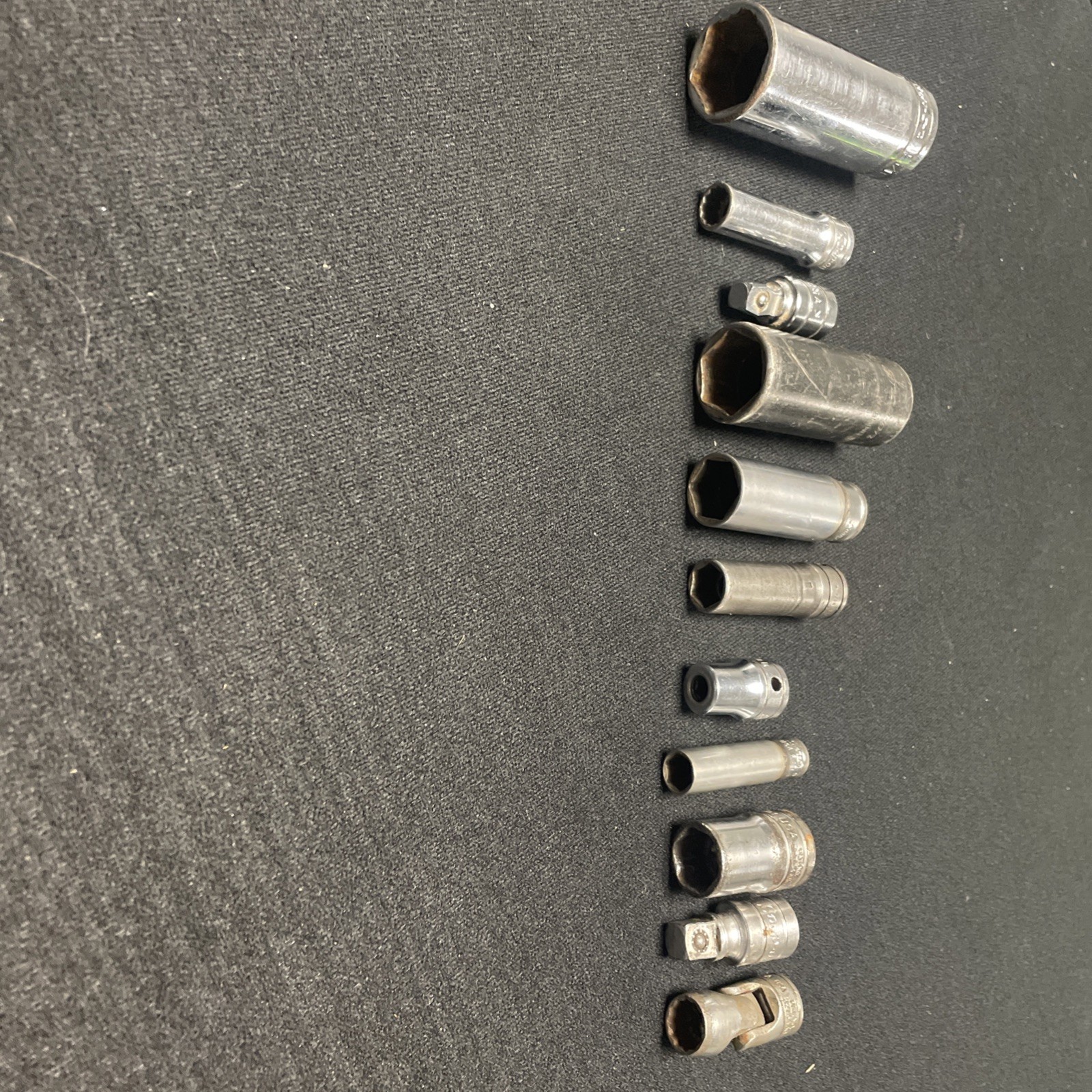 Snap On Socket Lot. 11 Pieces. Varied sizes, series and conditions.