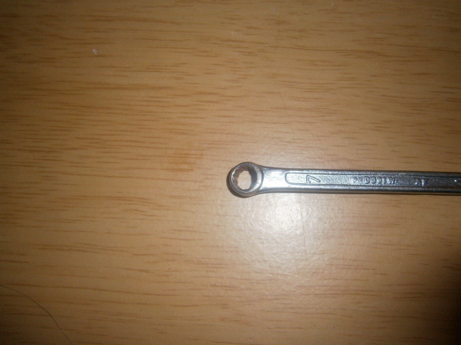 Vintage silver tone spanner. 7mm both ends.(E6c)