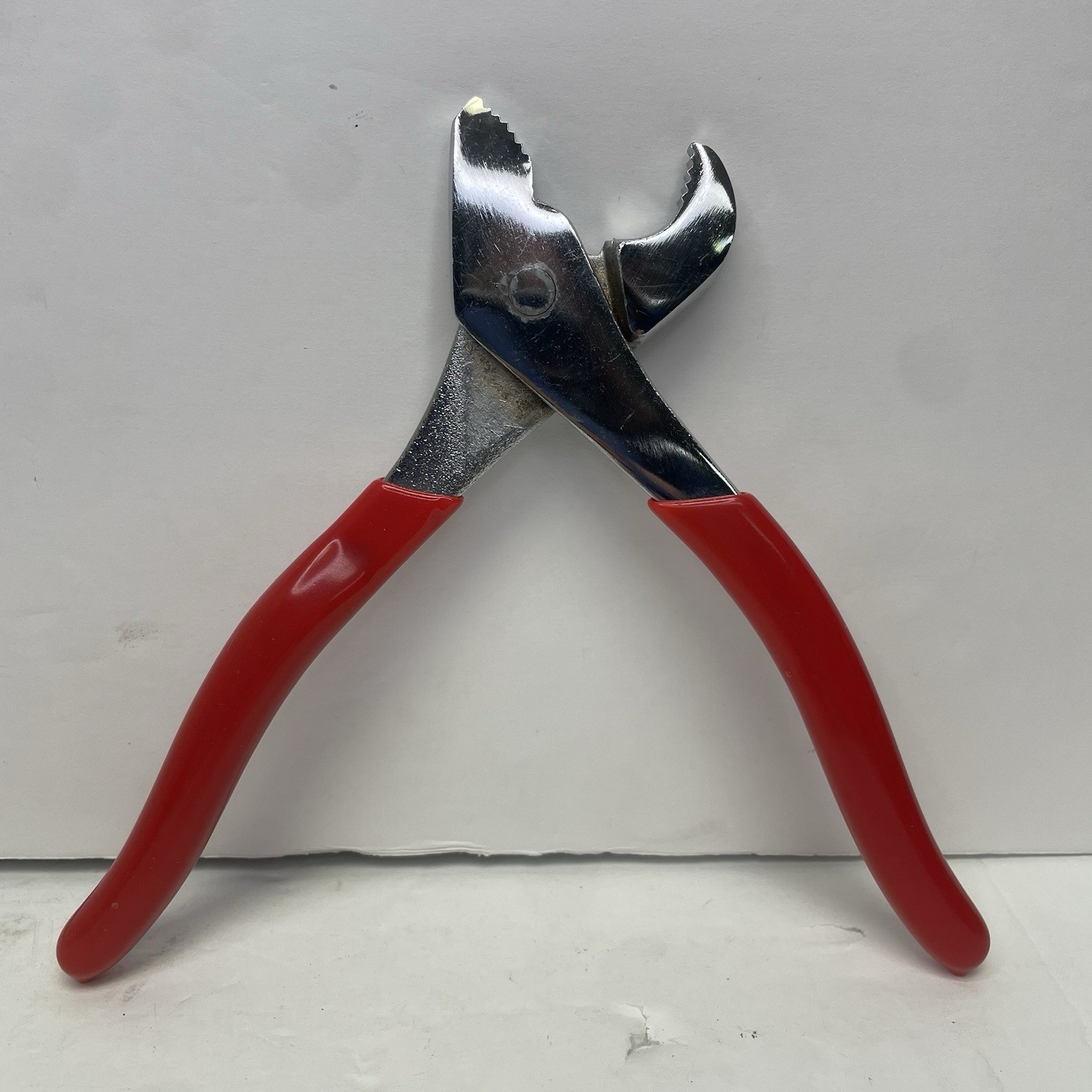 Angle nose battery nut pliers – red handle – 7.5 in – used
