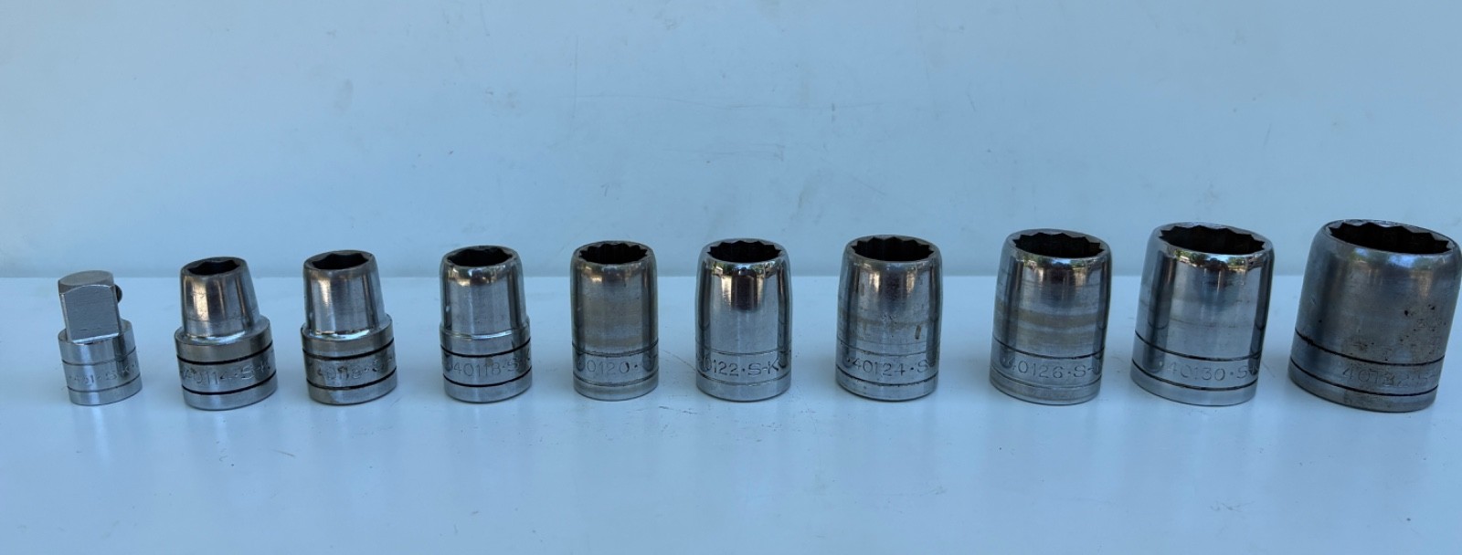 SK S-K Tools 1/2″ Drive SAE 12 Point & 6 Point Sockets + Adapter – 10 Piece Set