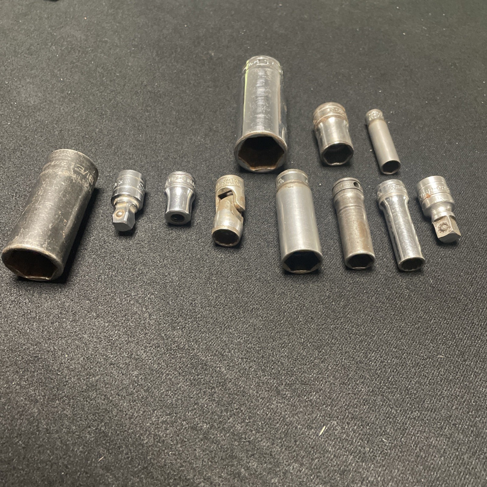 Snap On Socket Lot. 11 Pieces. Varied sizes, series and conditions.