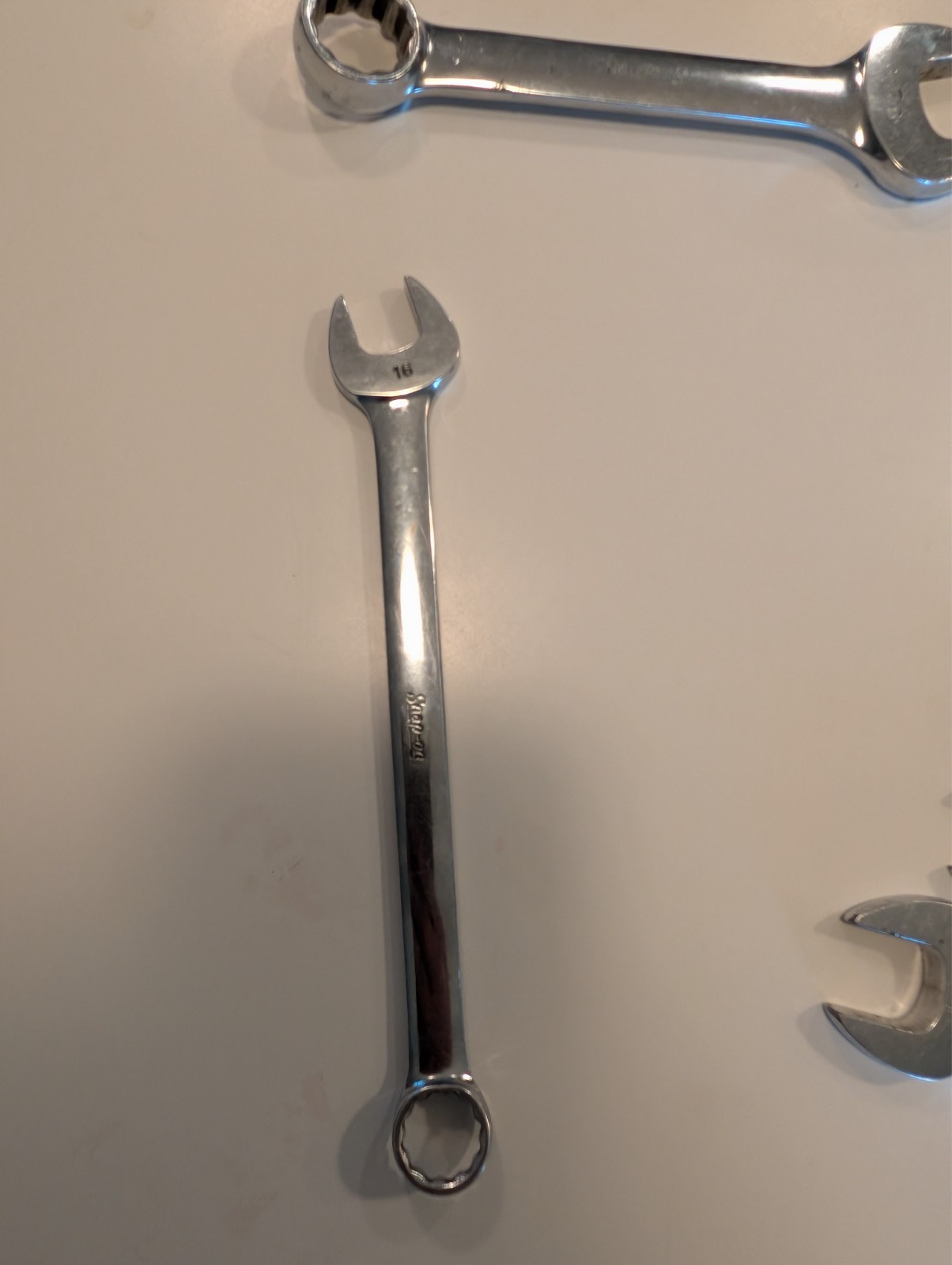 five snap-on wrenches. Four open end one swivel head. Decently well maintained