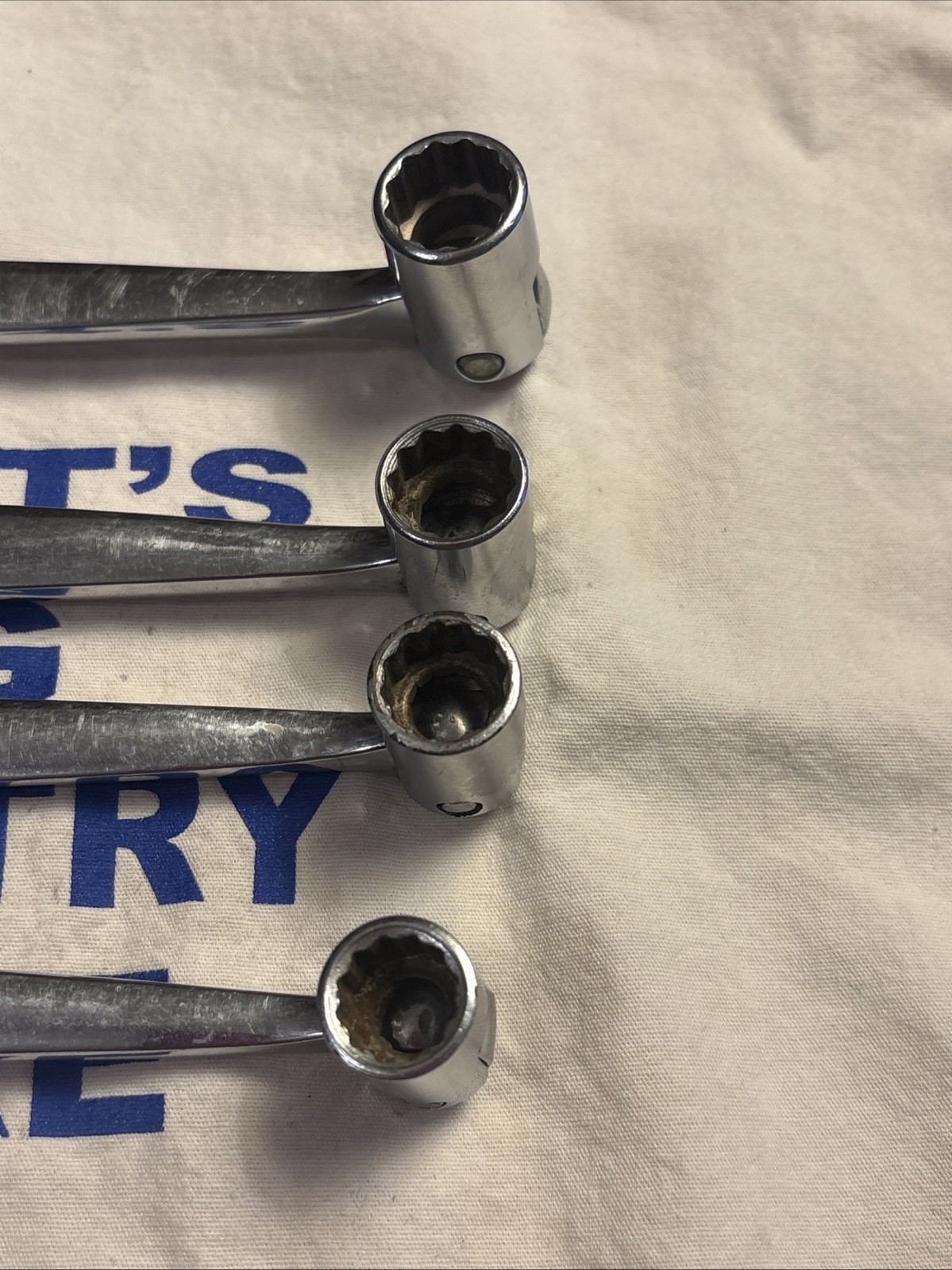 Snap-on 12 13 14 15MM Metric 12pt Swivel Flex Head/Open End Combo Wrench Set