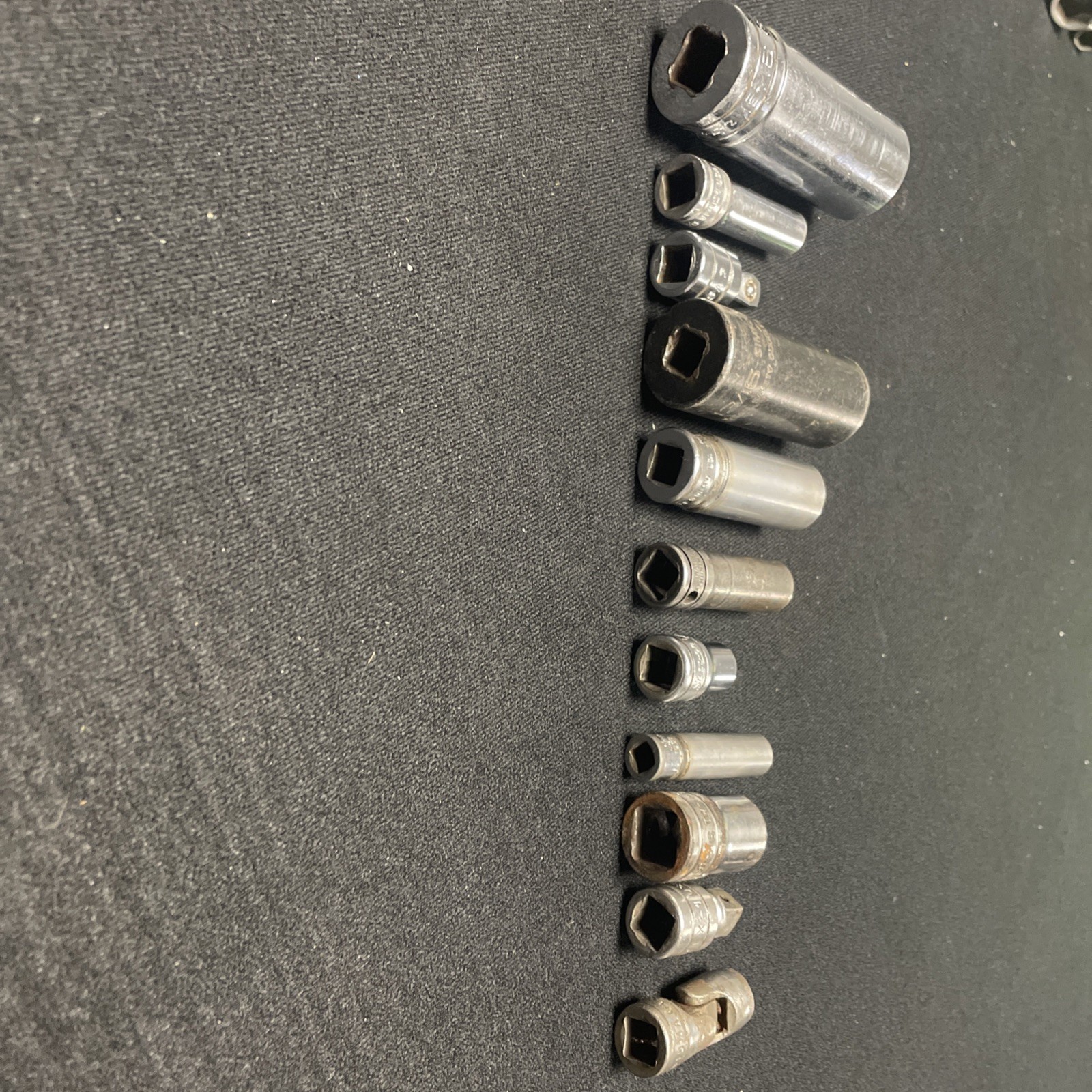 Snap On Socket Lot. 11 Pieces. Varied sizes, series and conditions.