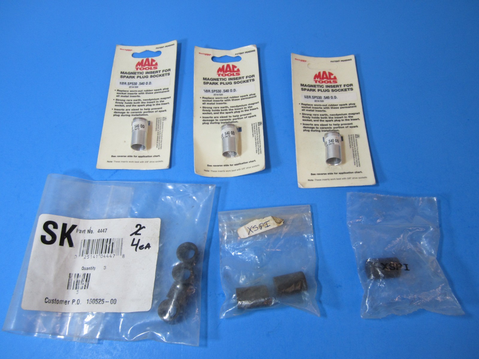 10-piece Mac Tools & SK Tools spark plug socket inserts magnetic & rubber