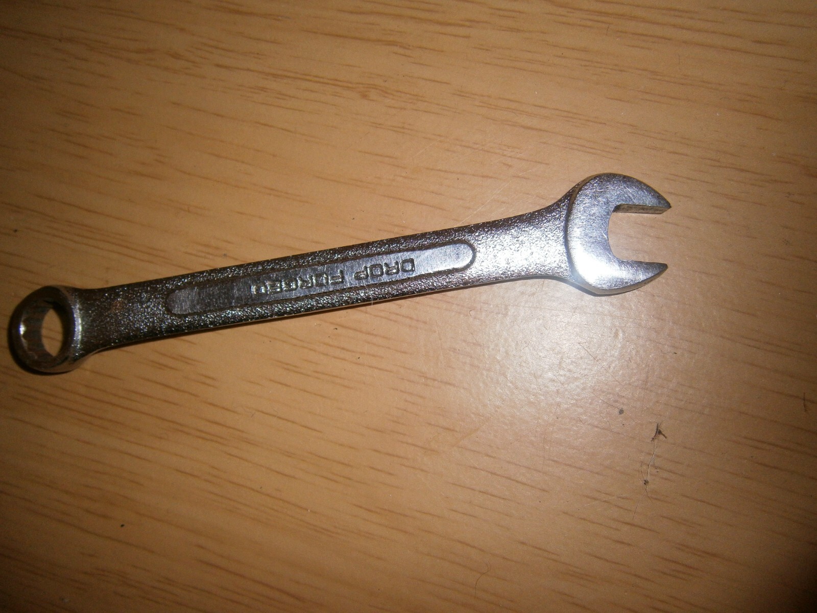 Vintage silver tone spanner. 10mm both ends (E6a)