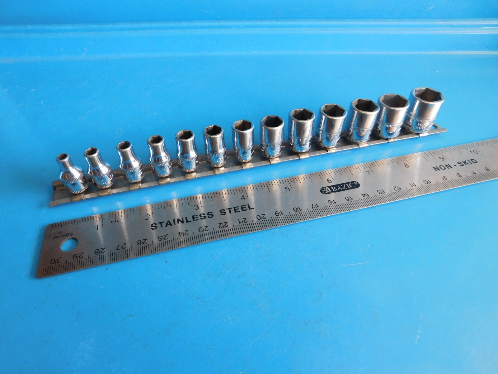 USED, SNAP ON 1/4 IN. DR. SHORT METRIC 6 PT. SOCKETS,13 TOTAL, 4 THRU 15MM