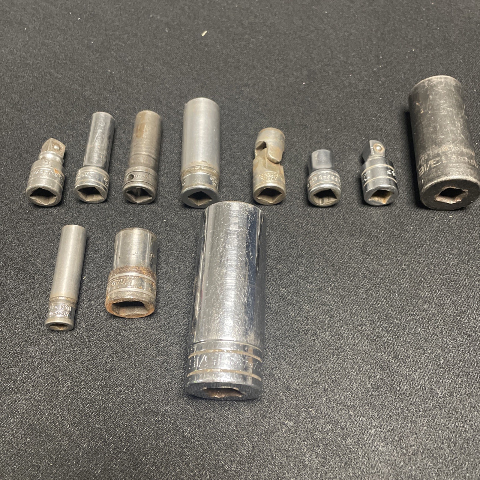 Snap On Socket Lot. 11 Pieces. Varied sizes, series and conditions.