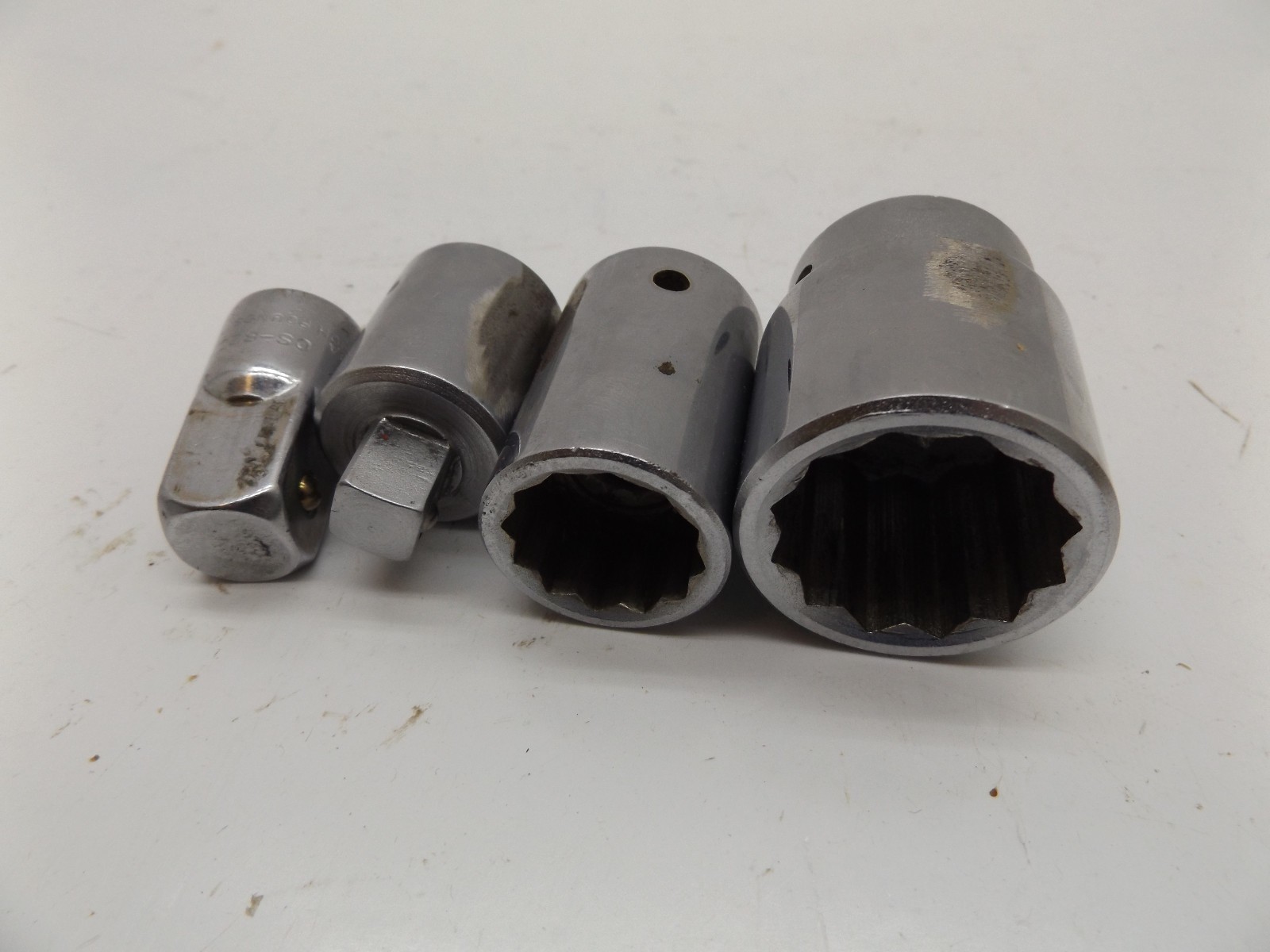 Wright 1-1/4″ & 15/16″ sockets 3/4″ dr Huskey 1/2″-3/4″ Thorsen 3/4 to 1/2″ 4pcs