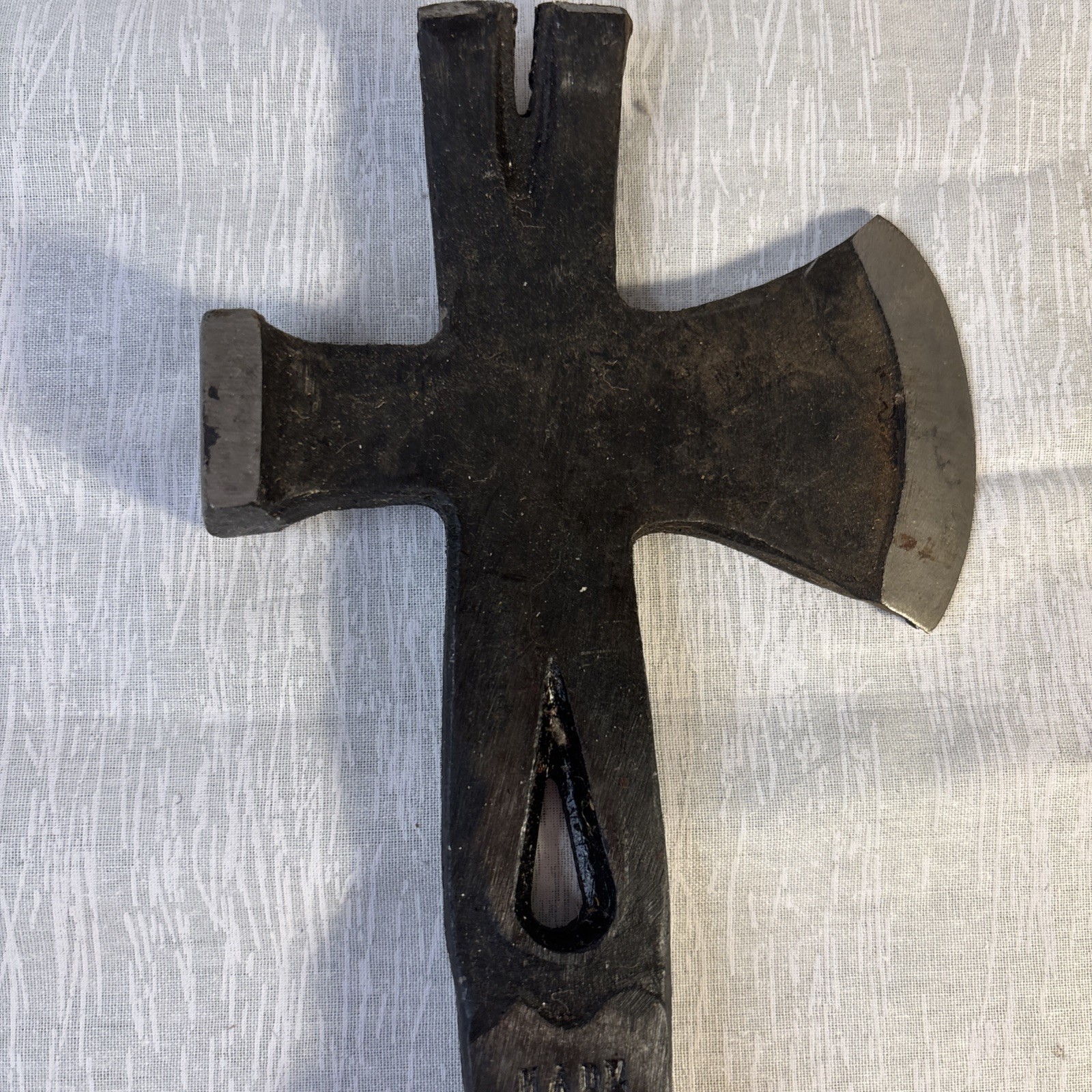 Hammer, Axe, Pry Bar With Black Blade And A Glossy Wooden Handle.
