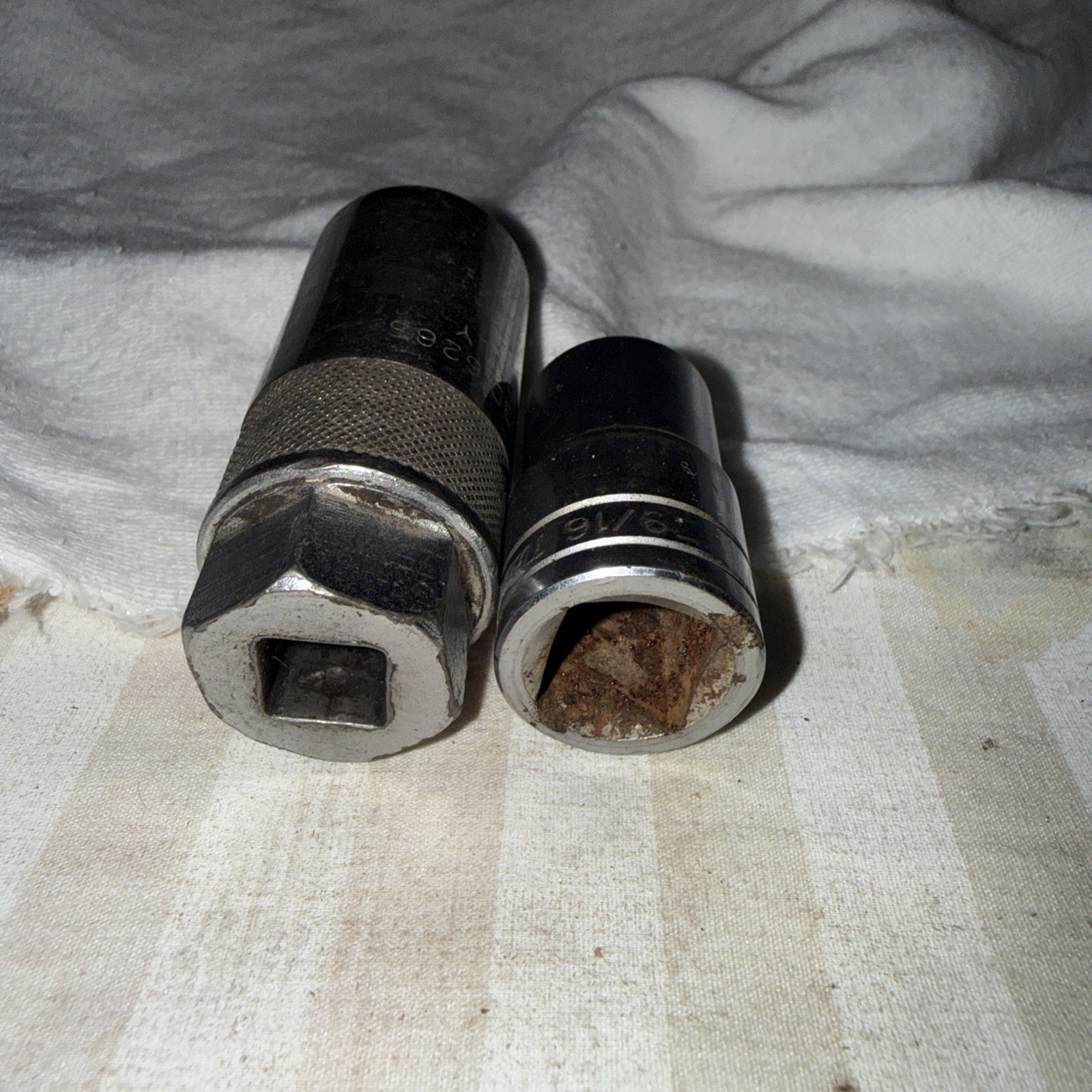 New Britain 3/8” Drive, Spark, Plug Socket, And A 9/16” STD Socket 1/2” Dr.