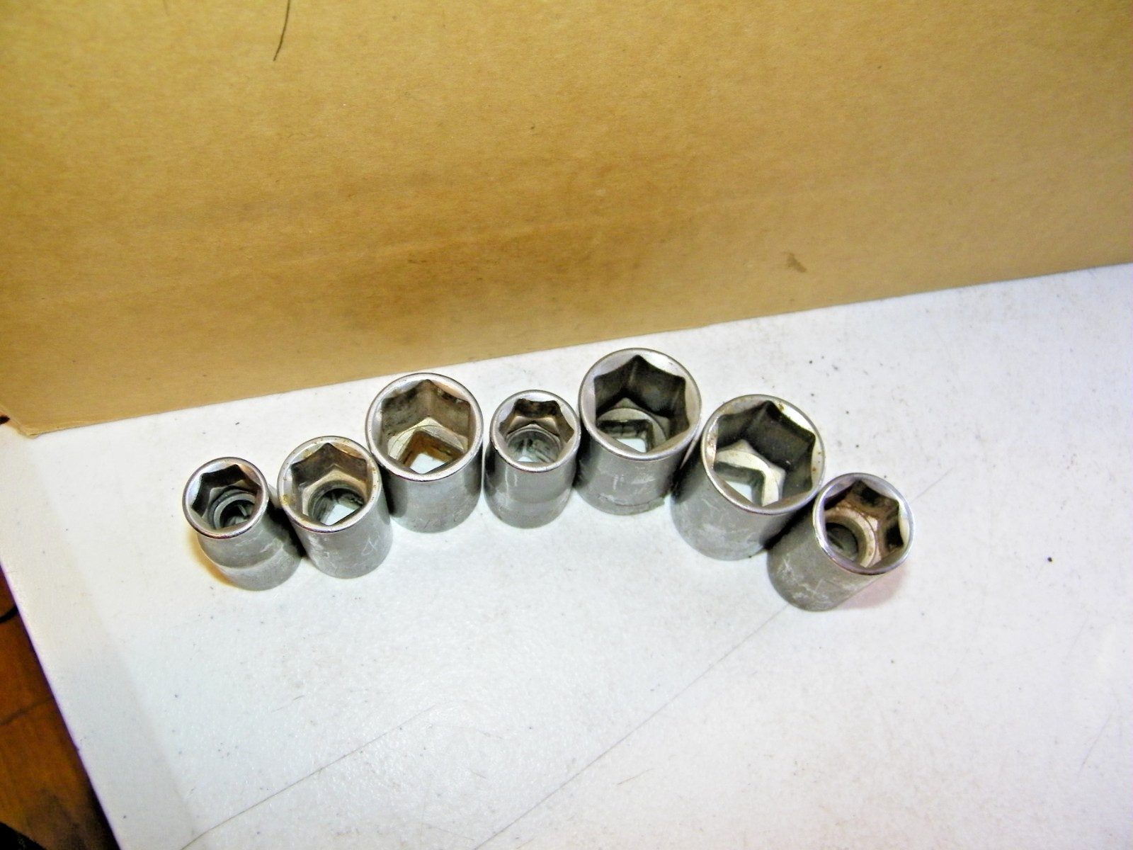 Lot Of 7 Truecraft Dr., 6 point Sockets 7/8, 13/16, 11/16, 3/4, 5/8,1/2, 9/16.