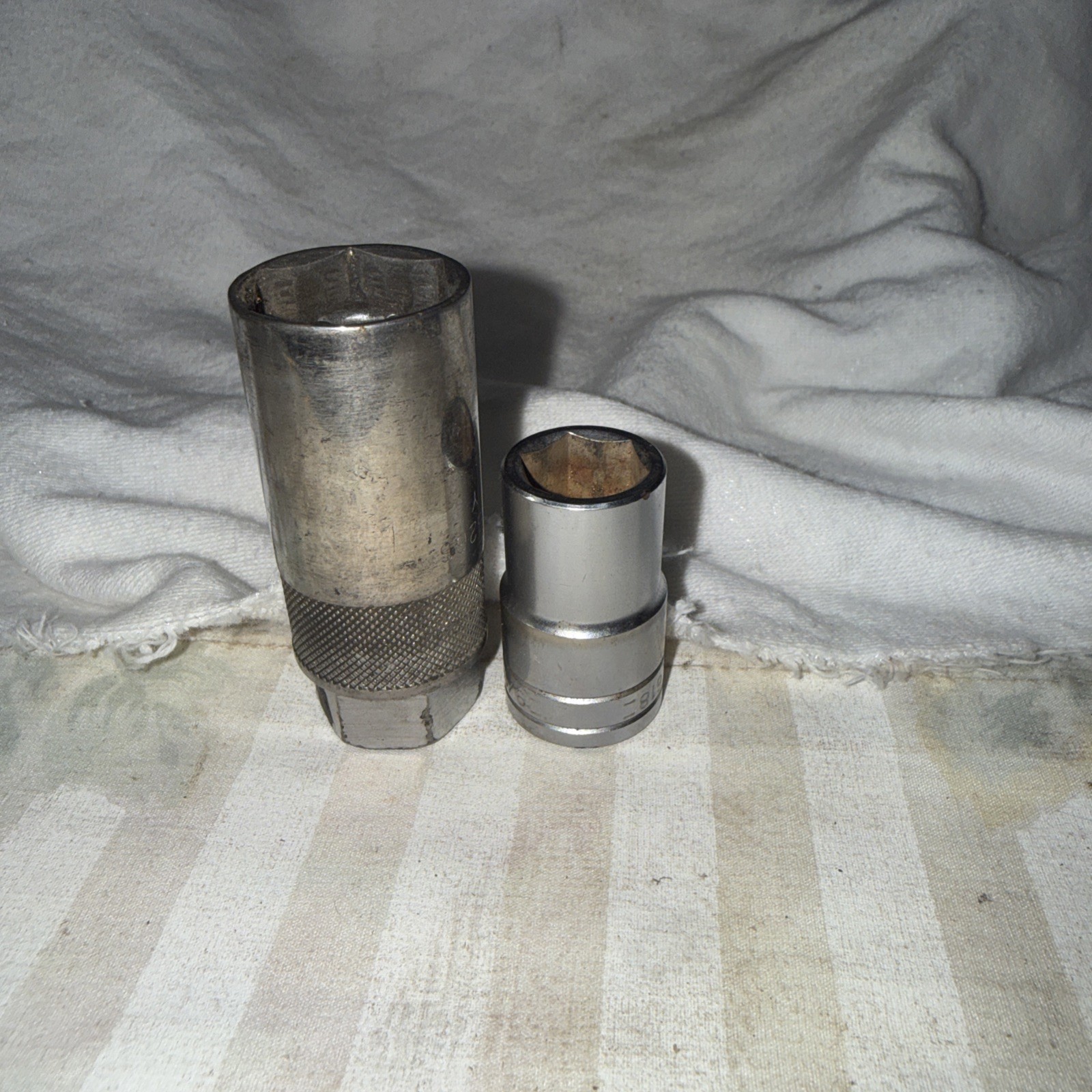 New Britain 3/8” Drive, Spark, Plug Socket, And A 9/16” STD Socket 1/2” Dr.