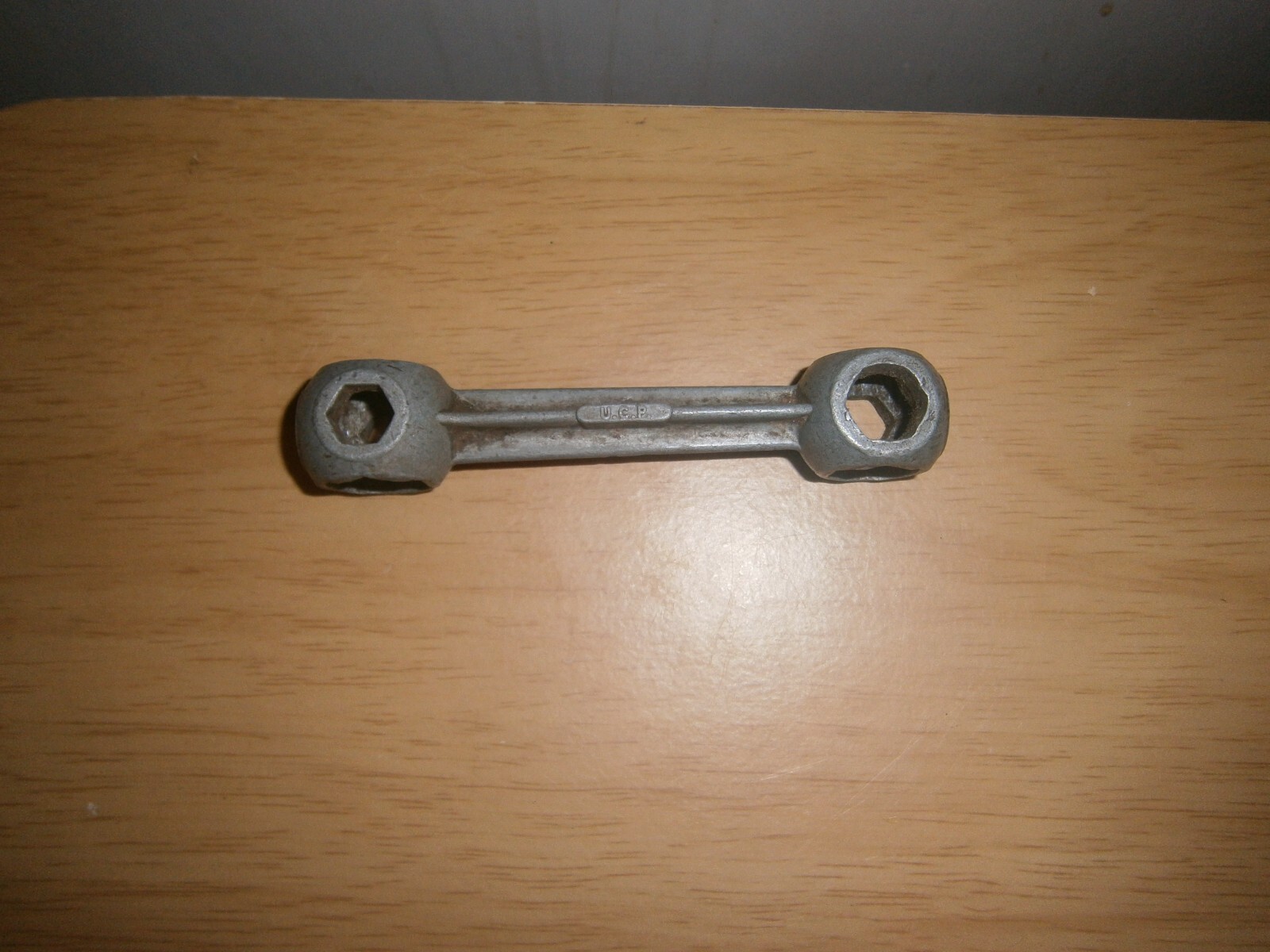 Vintage silver tone U.C.P. England multi spanner. 17mm end.(E6d)
