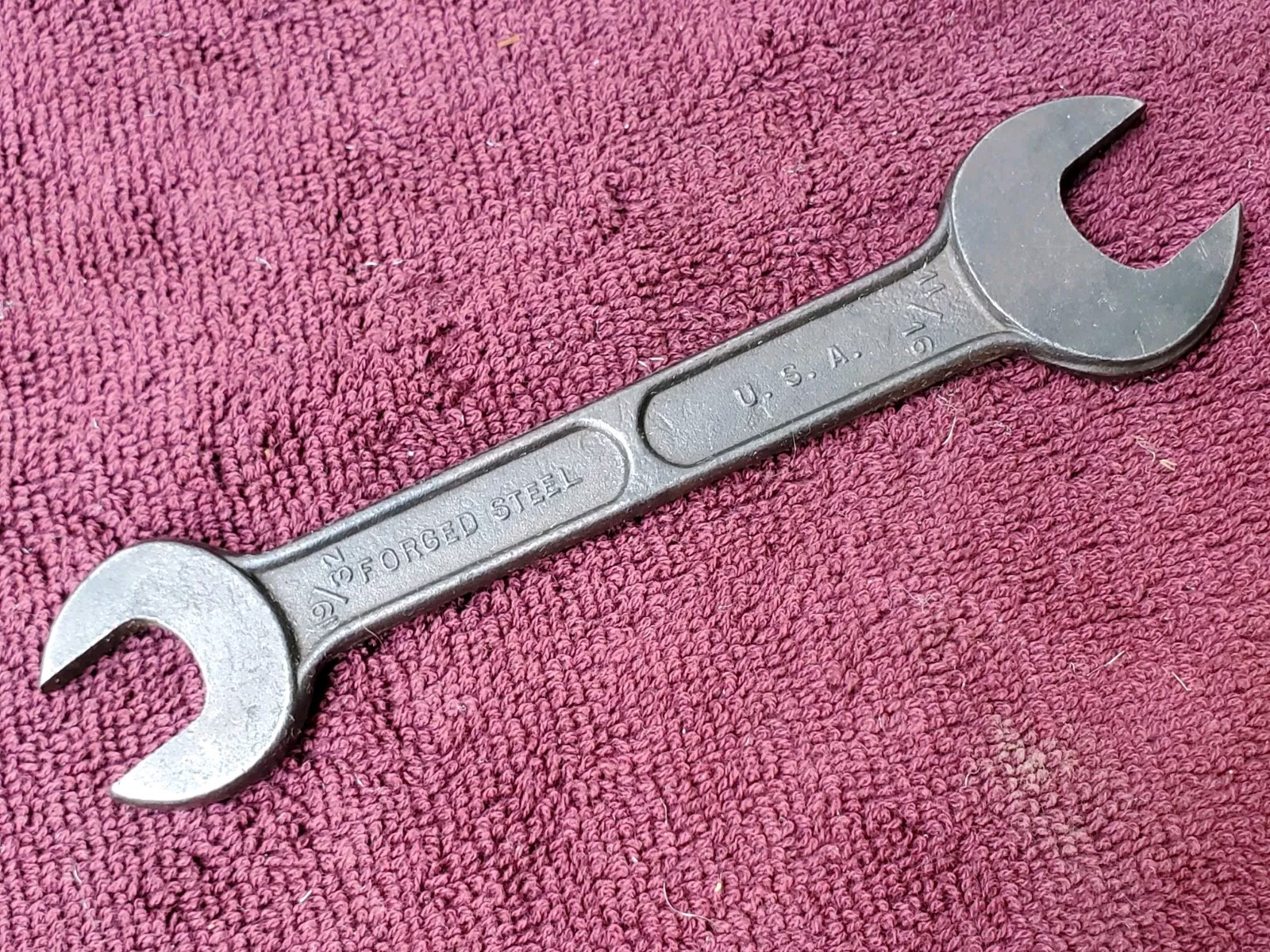 Unmarked 11/16″ by 19/32″ or 15 mm by 18 mm Open End Wrench