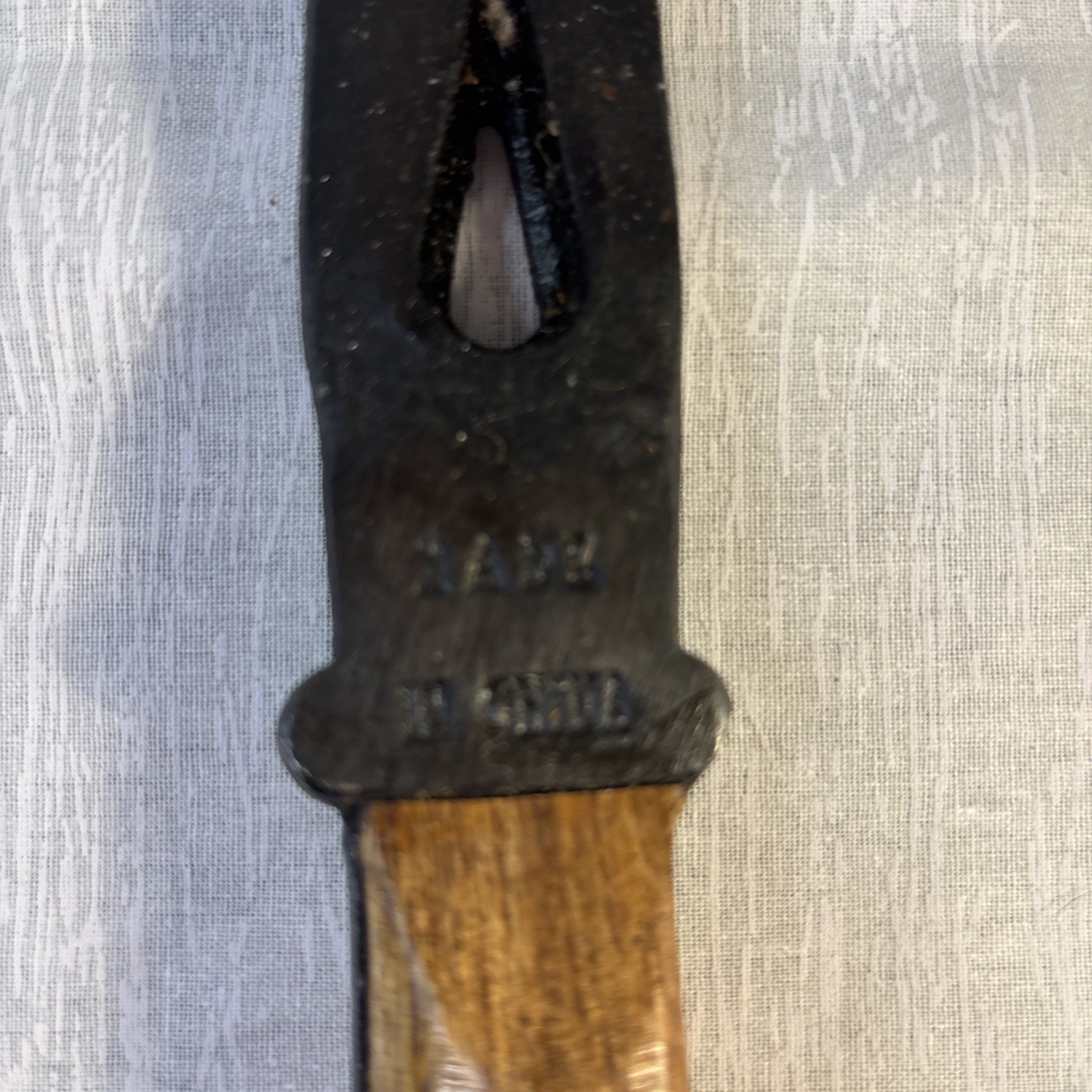 Hammer, Axe, Pry Bar With Black Blade And A Glossy Wooden Handle.