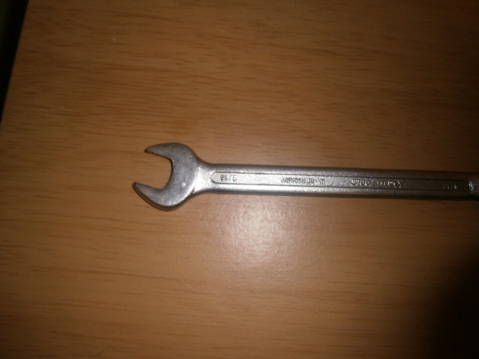 Vintage silver tone spanner. 9/16 both ends.(E6c)