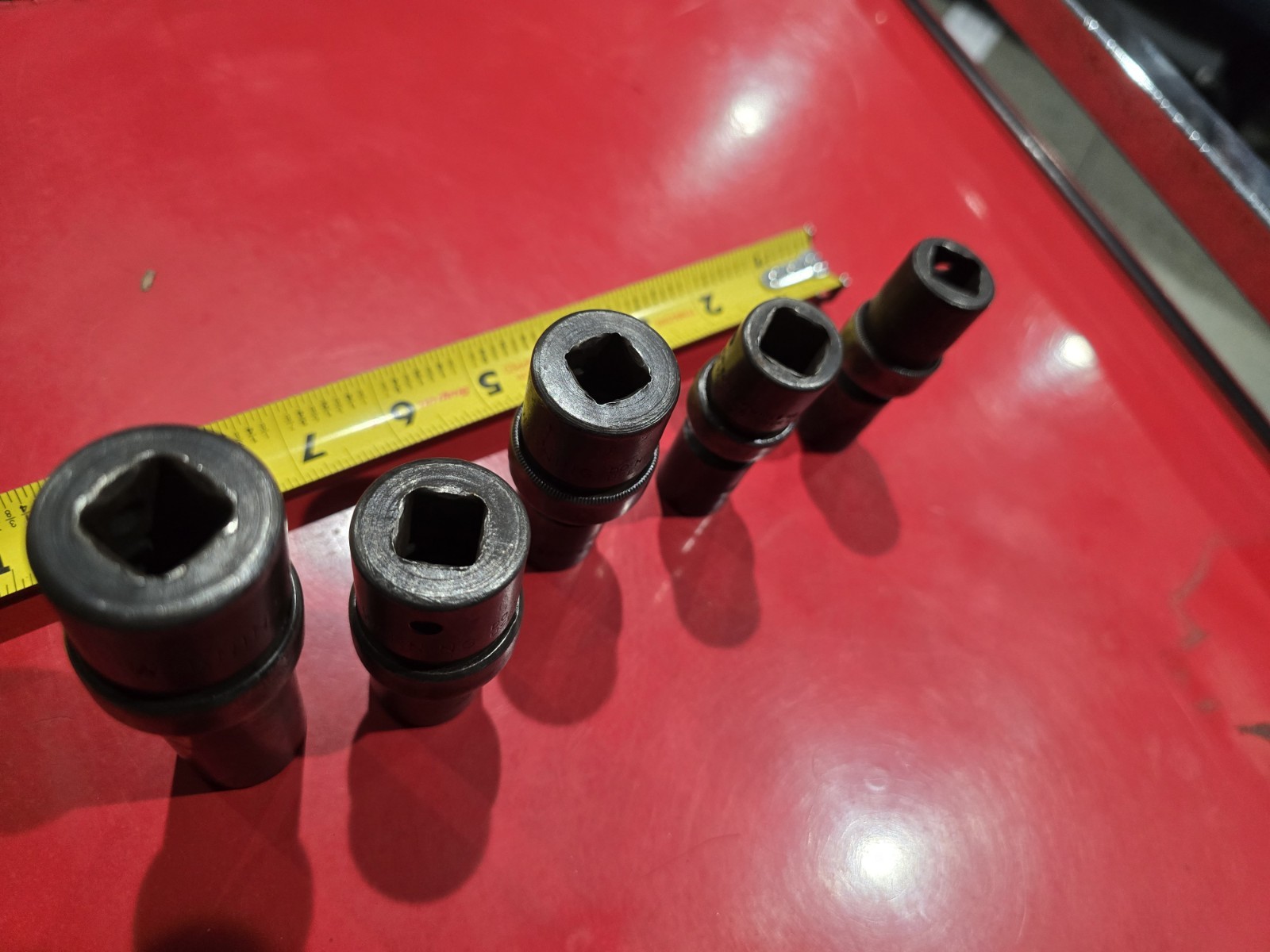 SNAP ON 1/2 DRIVE UNIVERSAL SWIVEL IMPACTS IN SAE. 4 PIECE SET WITH BONUS DEEP