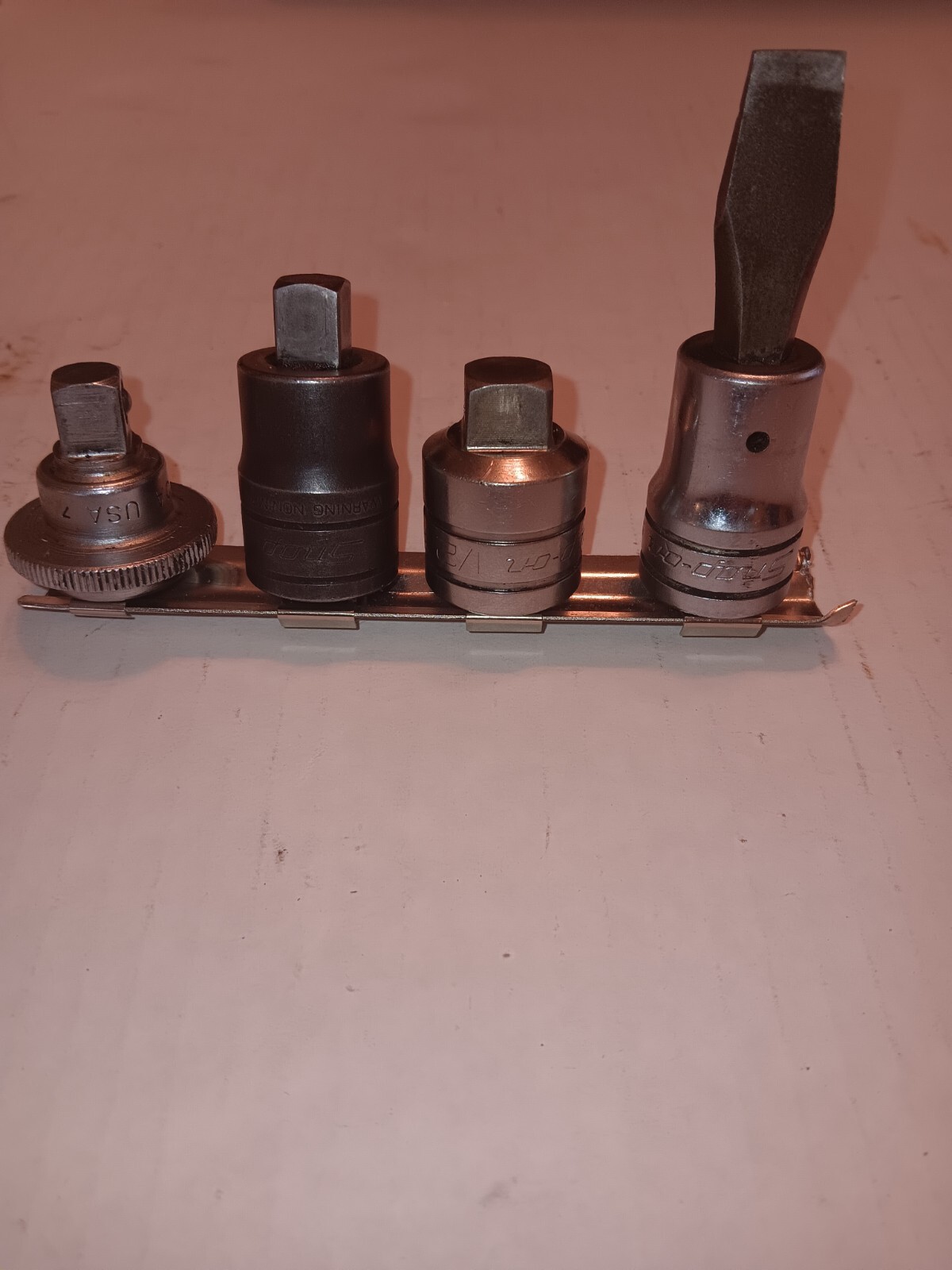 Snap-On 1/2 drive reducer plus 3 assorted pieces see description and pics