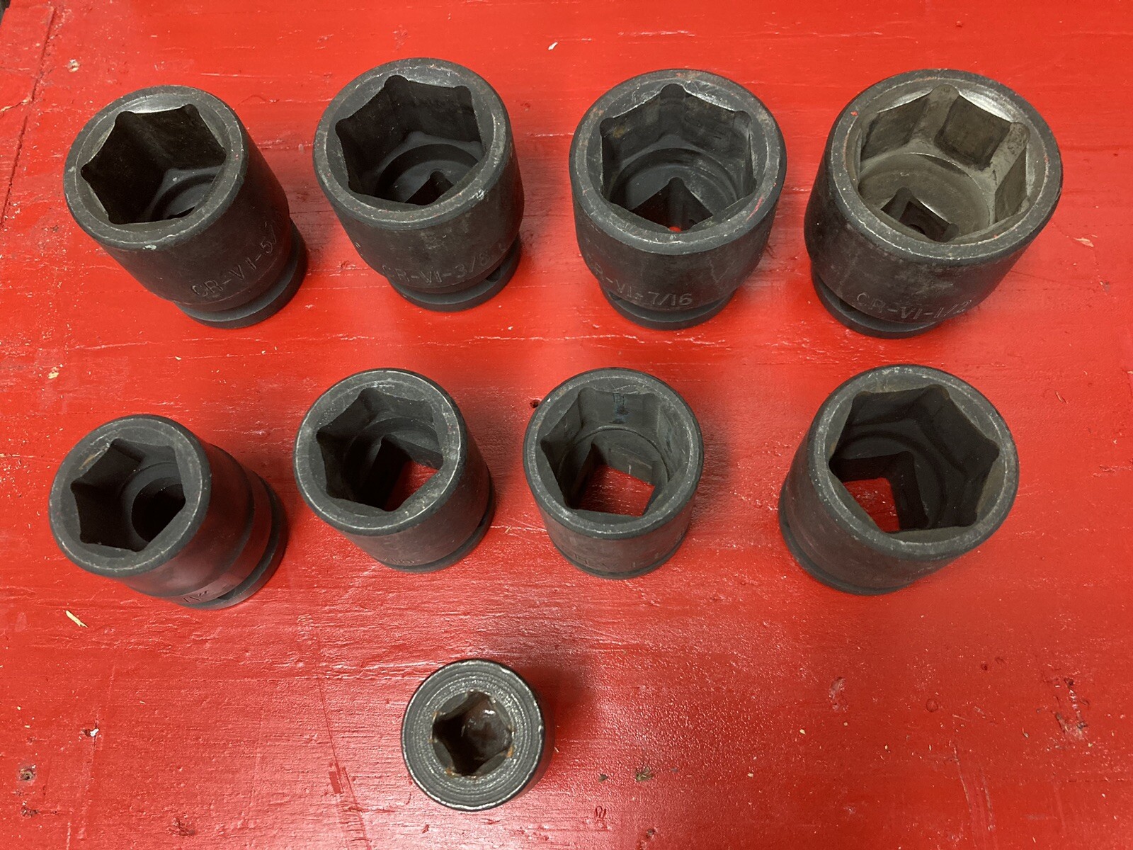 EIGHT 3/4 DRIVE STANDARD IMPACT SOCKETS . 1 IN THRU 1 1/2 IN WITH 1/2 ADAPTER
