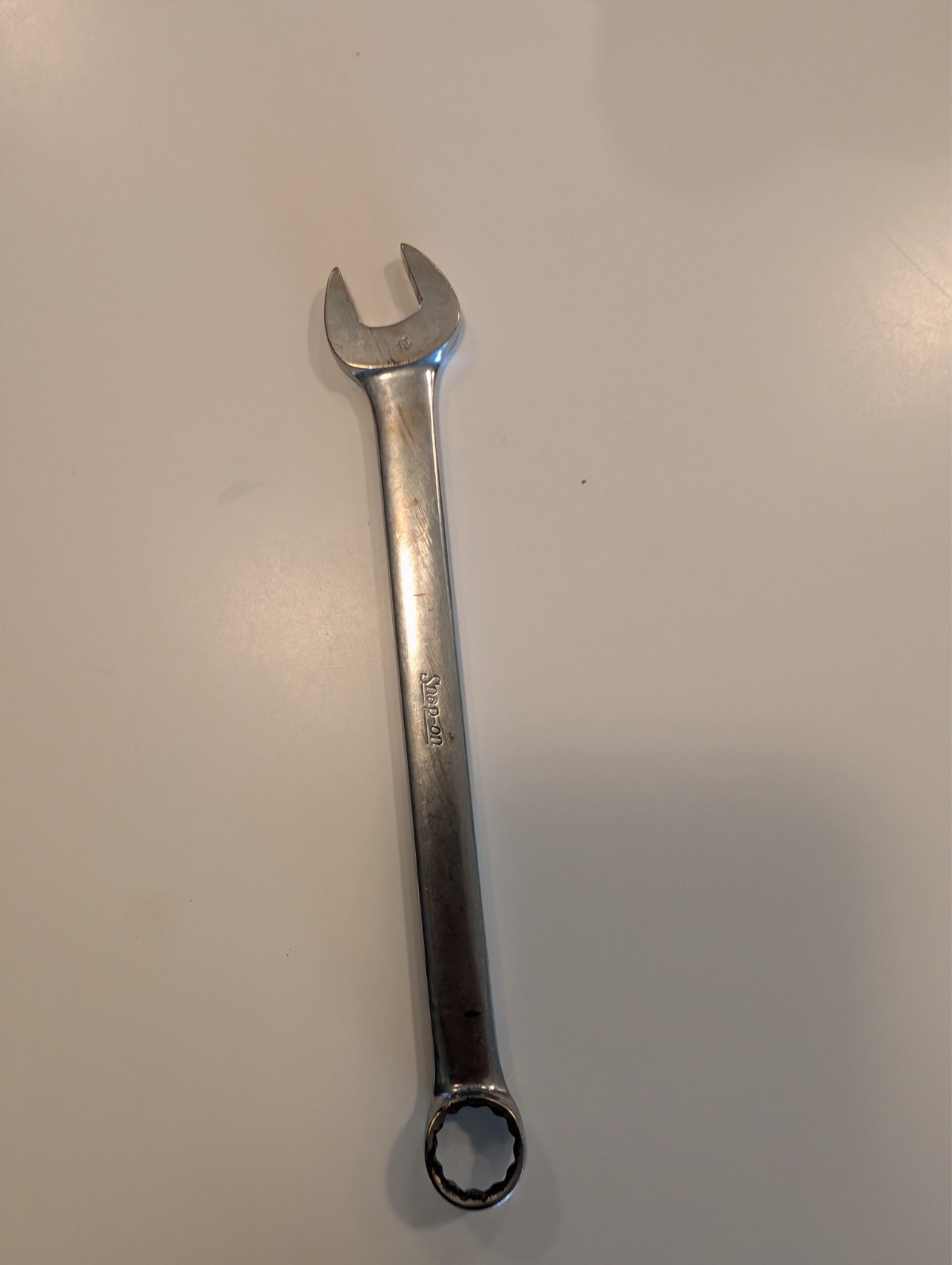 five snap-on wrenches. Four open end one swivel head. Decently well maintained