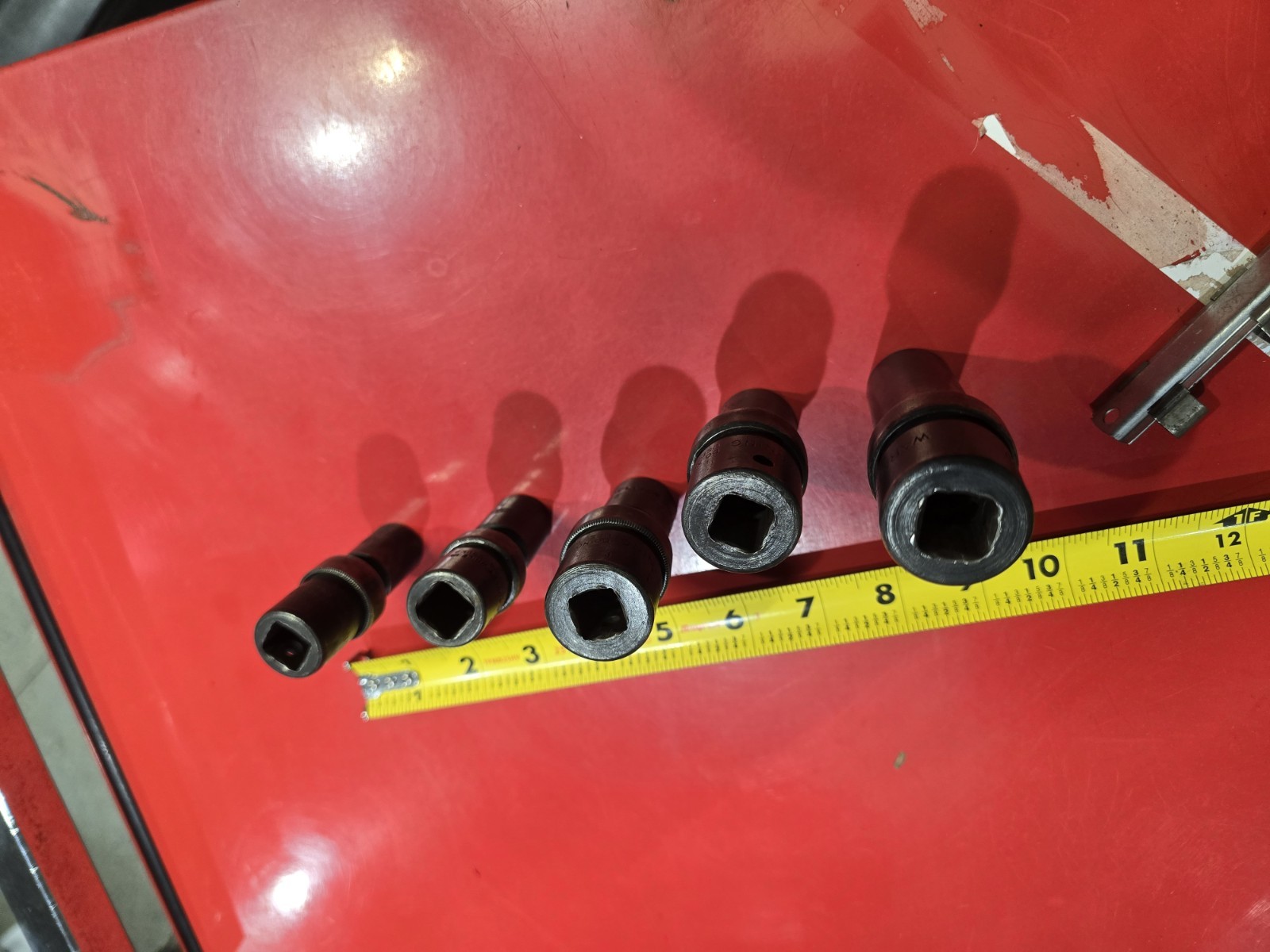 SNAP ON 1/2 DRIVE UNIVERSAL SWIVEL IMPACTS IN SAE. 4 PIECE SET WITH BONUS DEEP