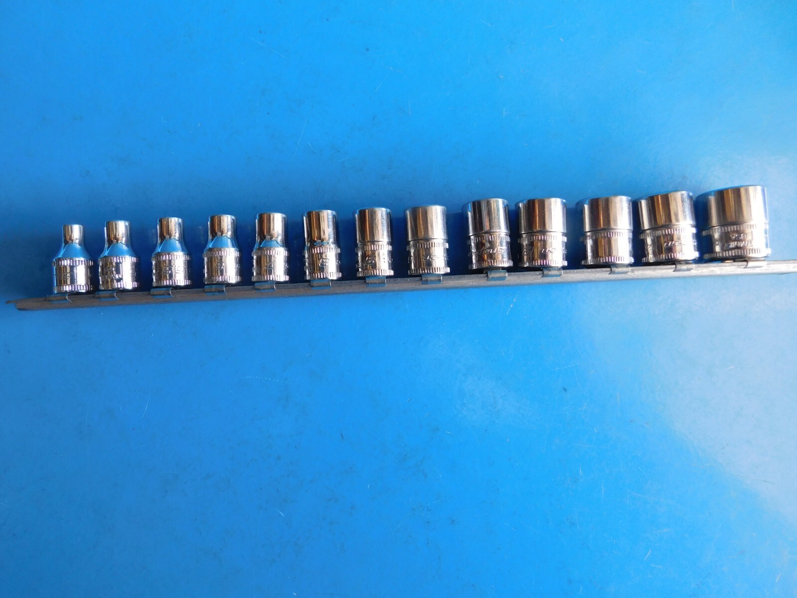 USED, SNAP ON 1/4 IN. DR. SHORT METRIC 6 PT. SOCKETS,13 TOTAL, 4 THRU 15MM
