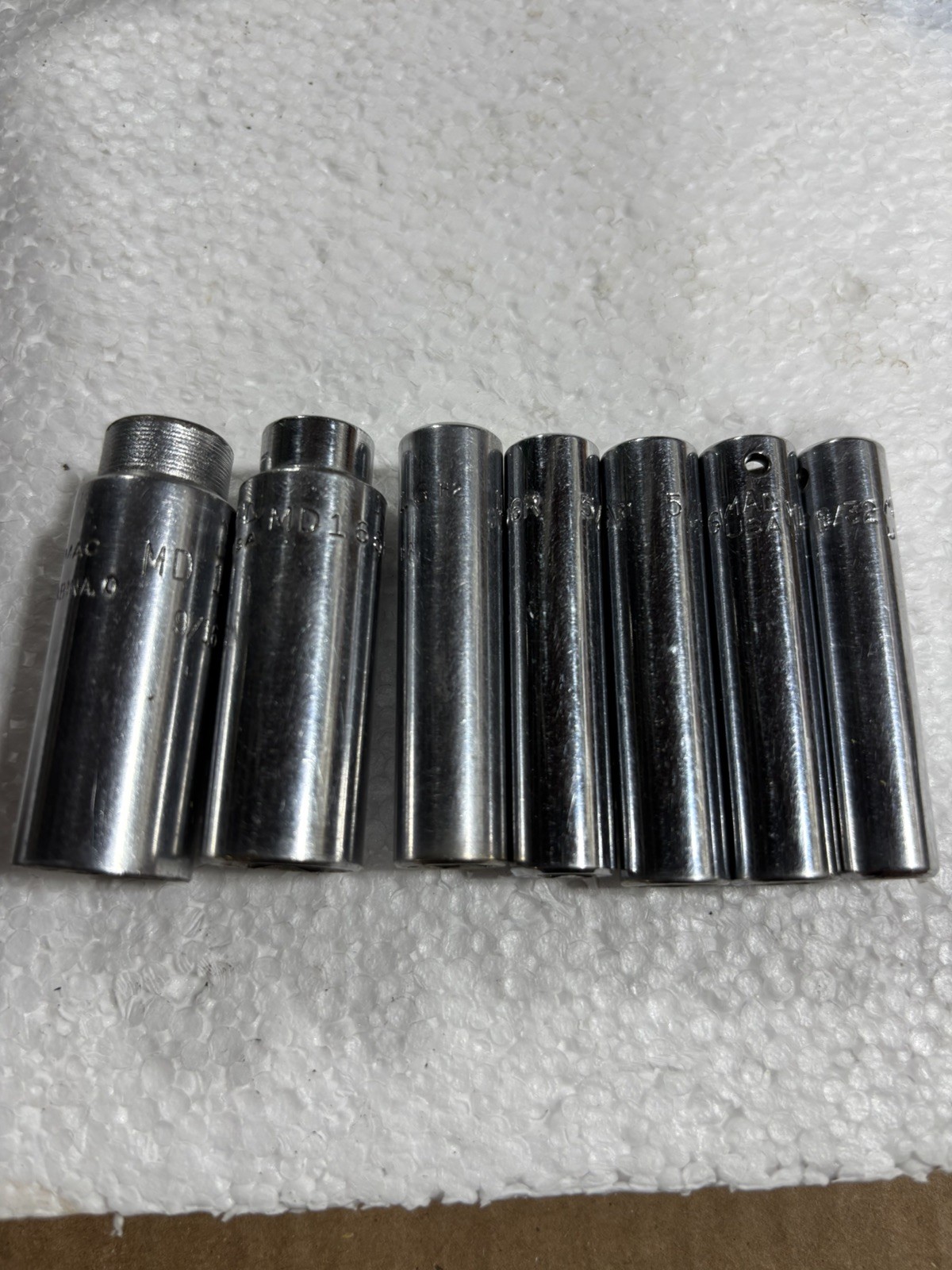 Assortment of 7 MAC deep 1/4” drive sockets