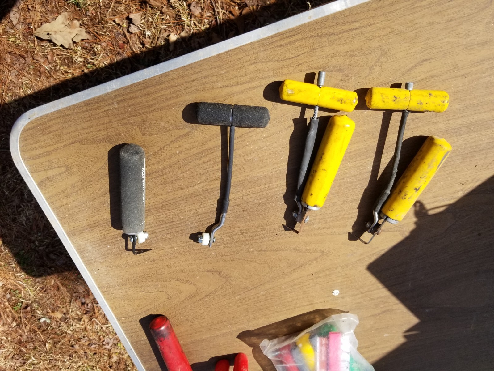 misc auto glass tools… door panel . Clip .cold kinfe.. dremel… pin  tool