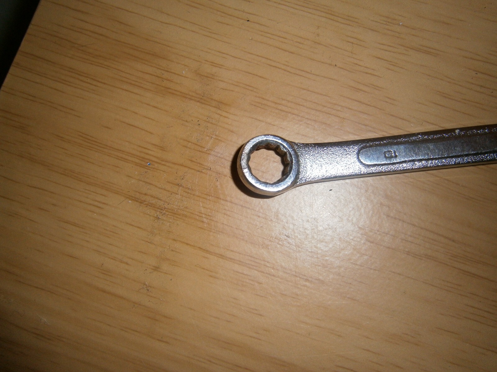 Vintage silver tone spanner. 10mm both ends (E6a)