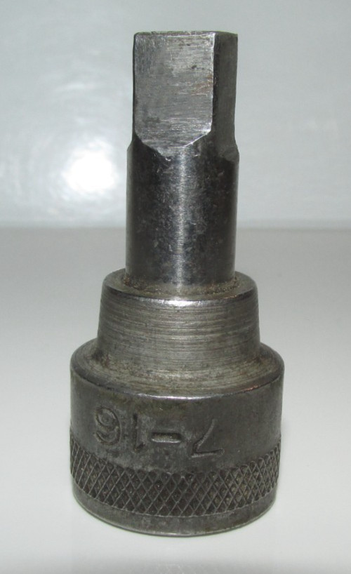 T #169 – Unbranded, 3/8 male to 1/2″ female socket adapter, Marked 7-16
