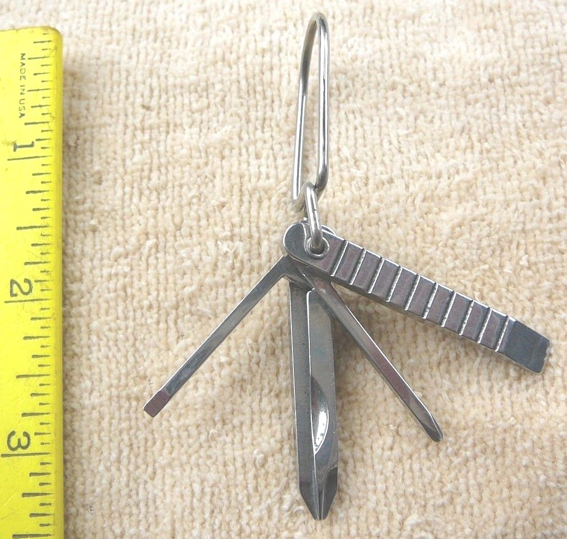 Pocket size screw drivers on a ring four heads New