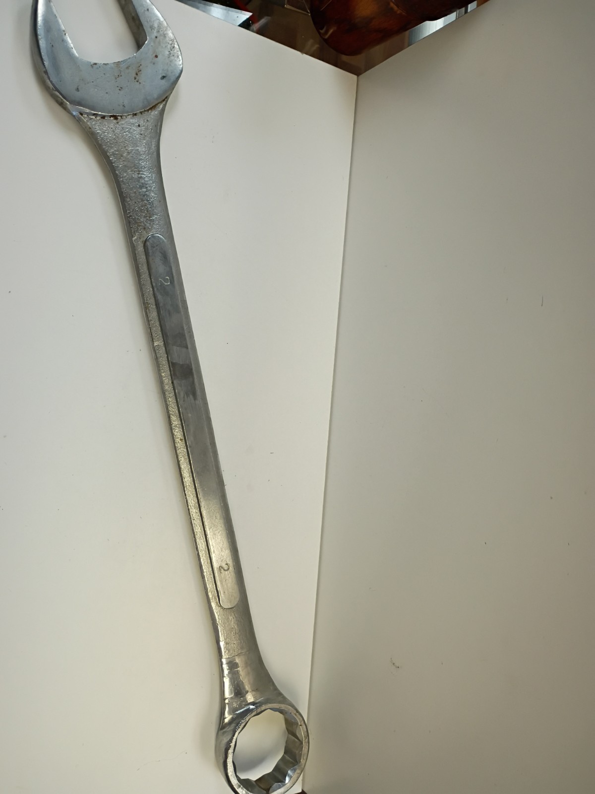 2-inch combination wrench featuring an open end and a 12-point box end