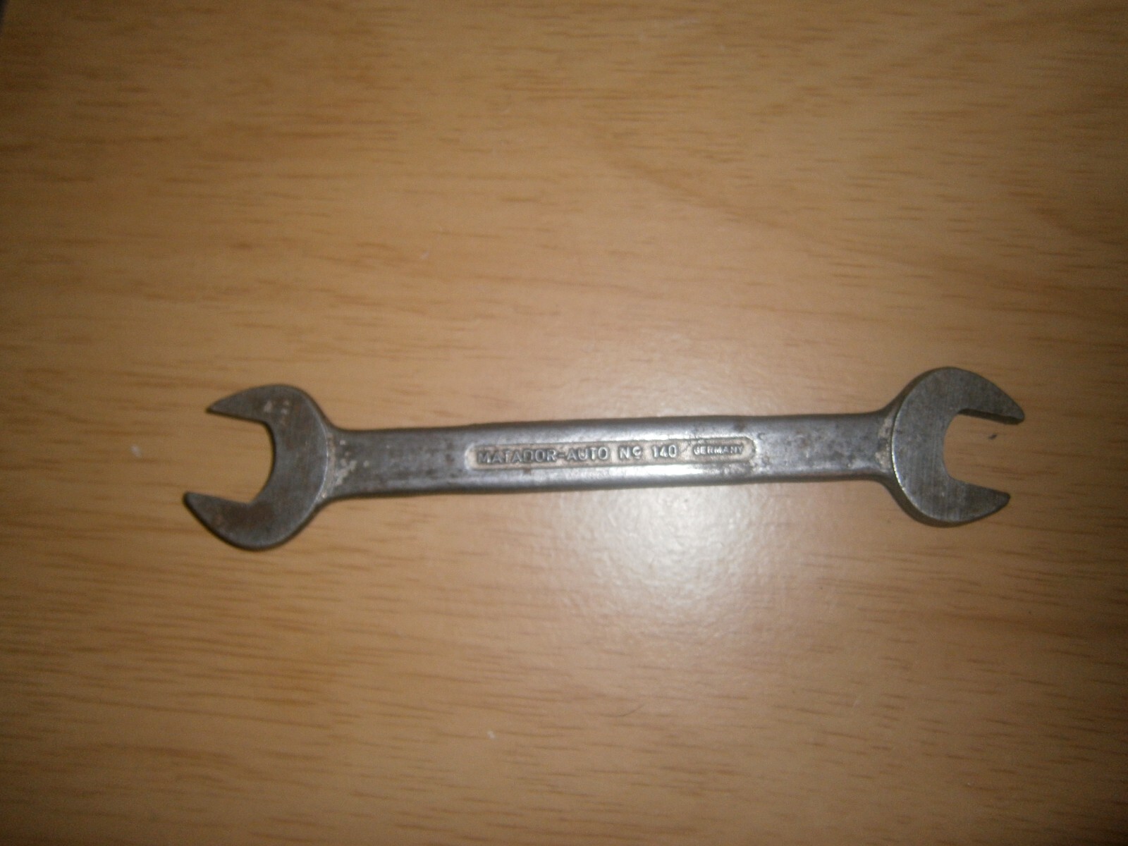 Vintage silver tone spanner. 5/16 & 1/4 W ends.(E6c)