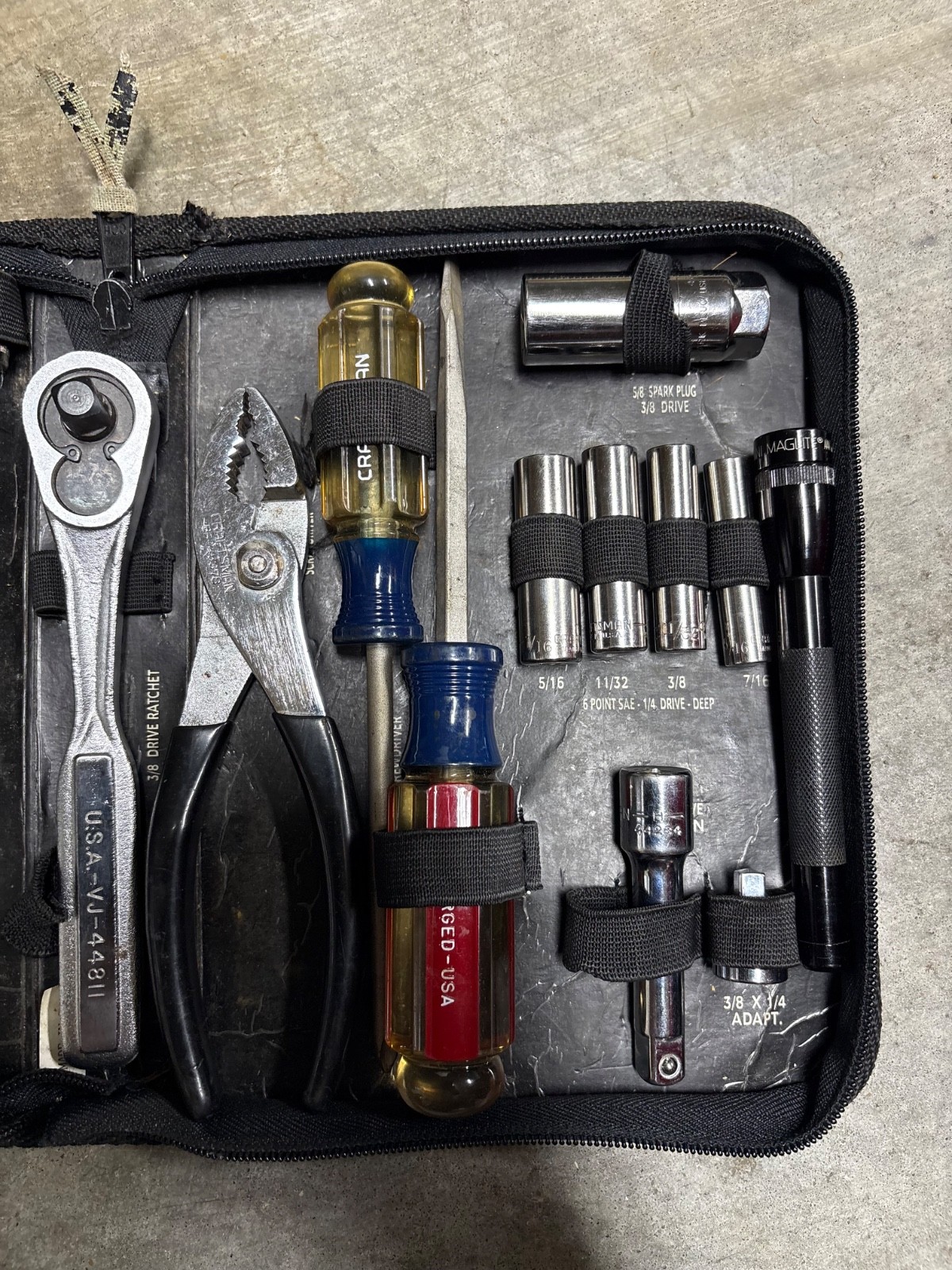 Sears Craftsman 55-piece mechanics tool set and a MAGLITE