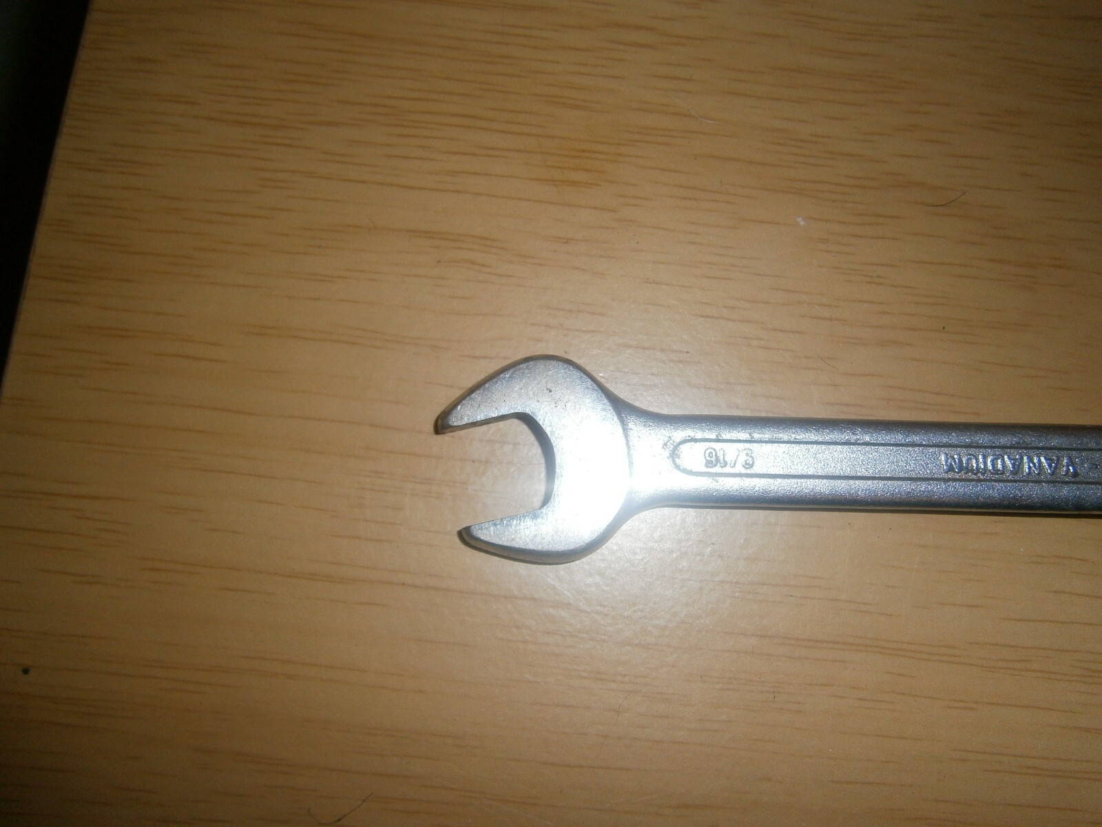 Vintage silver tone spanner. 9/16 both ends.(E6c)