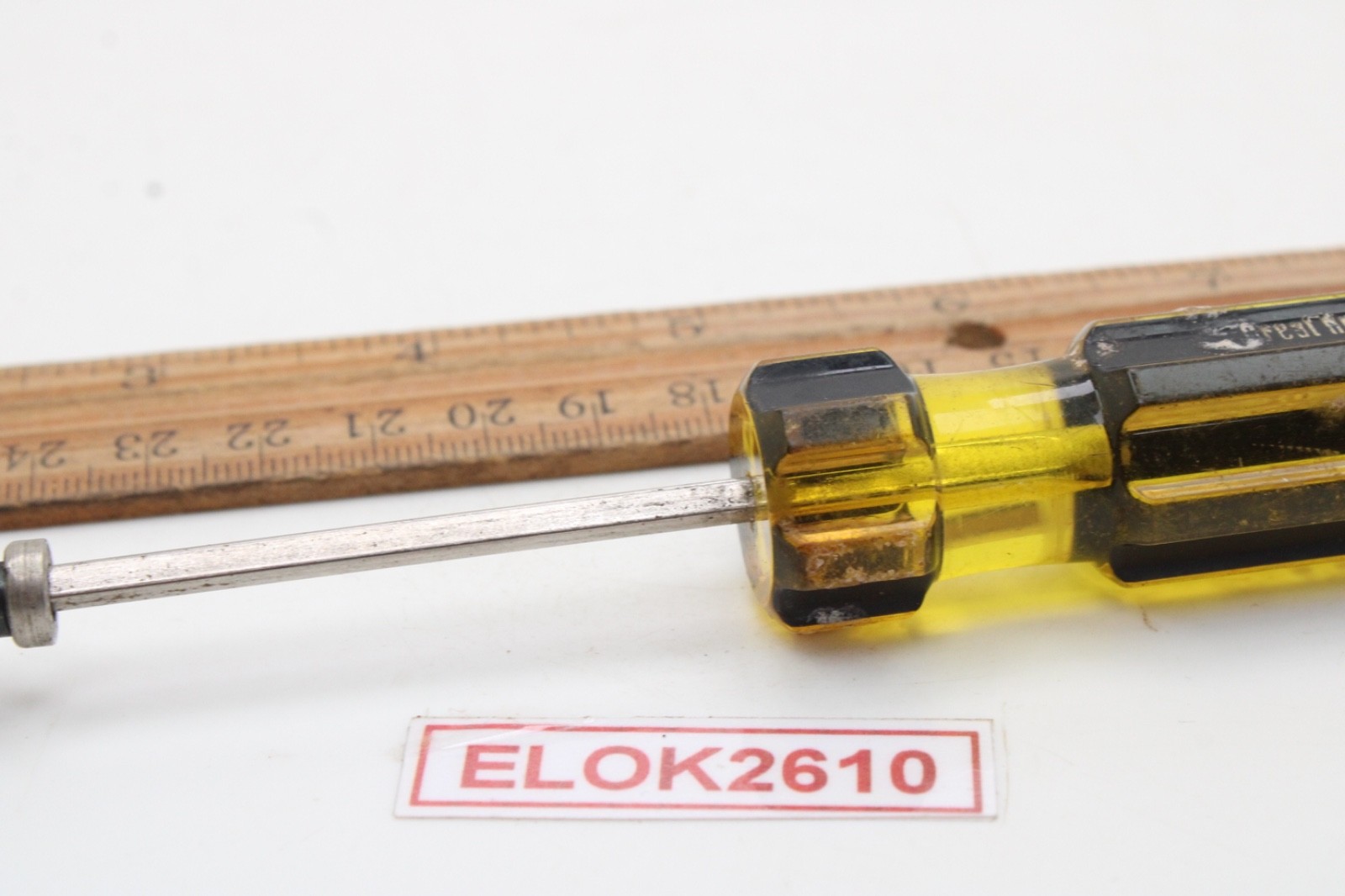 Great Neck Hard Amber/Black Handle Holding Slotted Flat Screwdriver