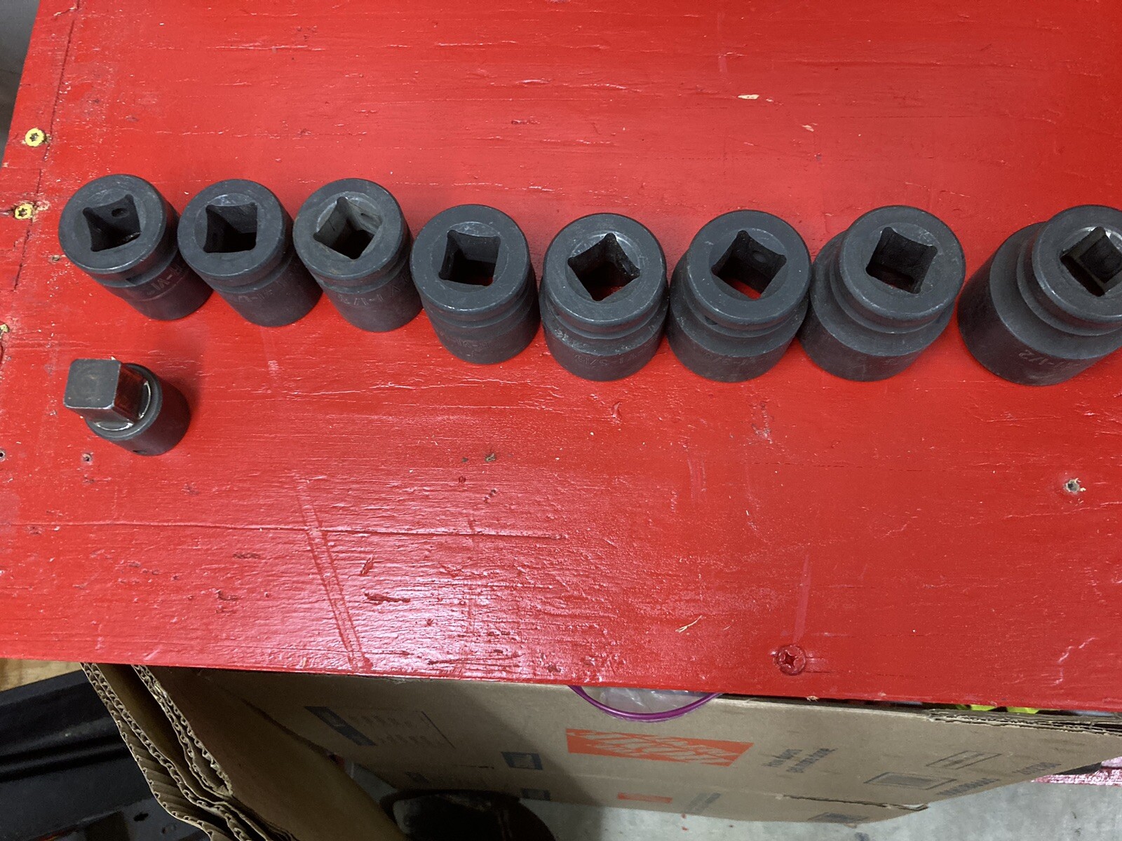 EIGHT 3/4 DRIVE STANDARD IMPACT SOCKETS . 1 IN THRU 1 1/2 IN WITH 1/2 ADAPTER