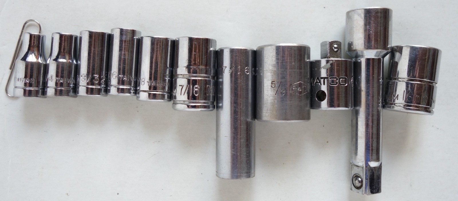 Lot of 11 pieces Sockets SAE and Metric, Extension, and Drive Adapter.