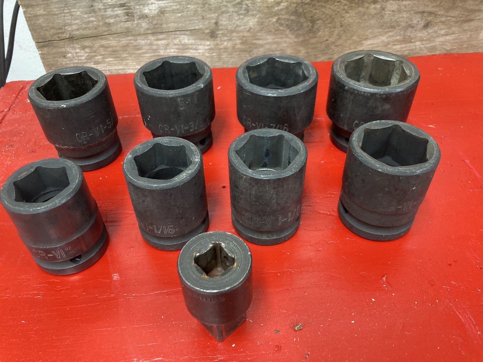 EIGHT 3/4 DRIVE STANDARD IMPACT SOCKETS . 1 IN THRU 1 1/2 IN WITH 1/2 ADAPTER