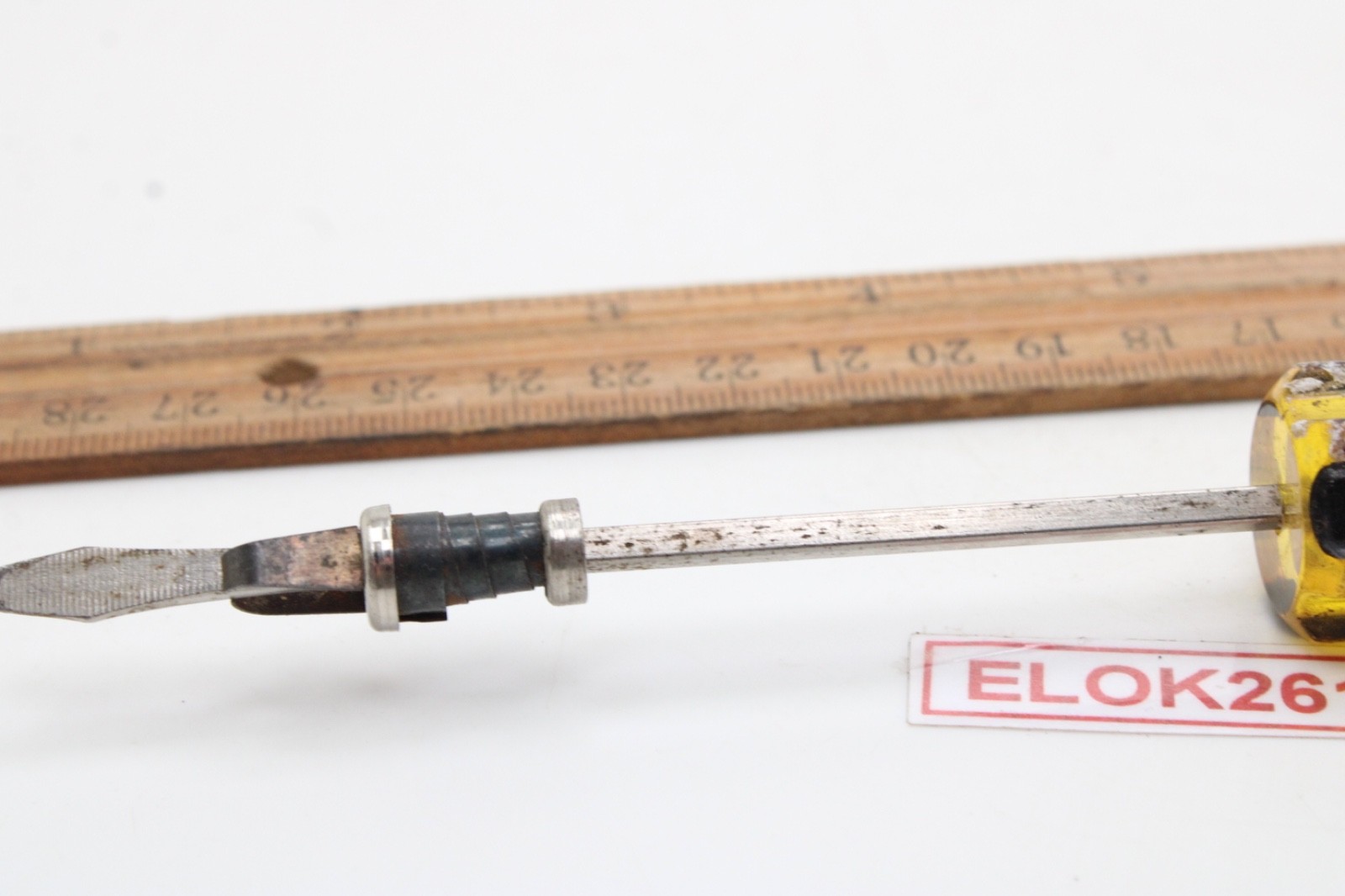 Great Neck Hard Amber/Black Handle Holding Slotted Flat Screwdriver