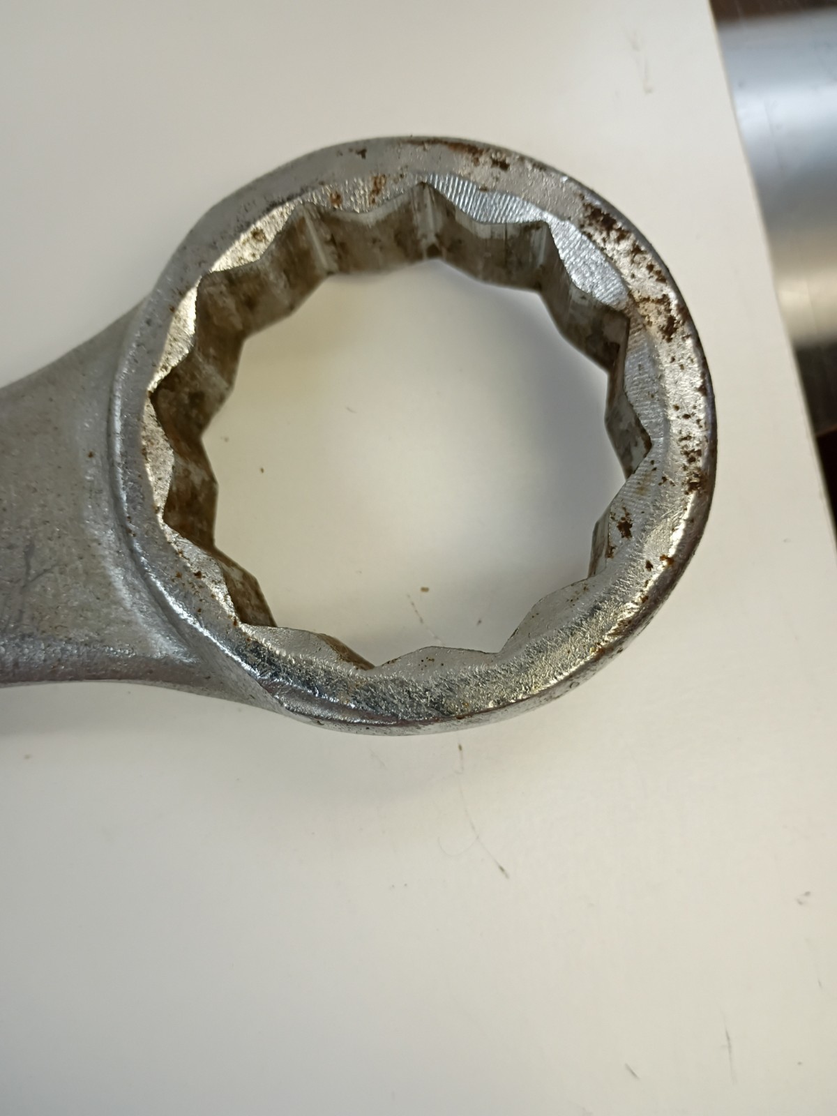 1 -7/8-inch combination wrench featuring an open end and a 12-point box end