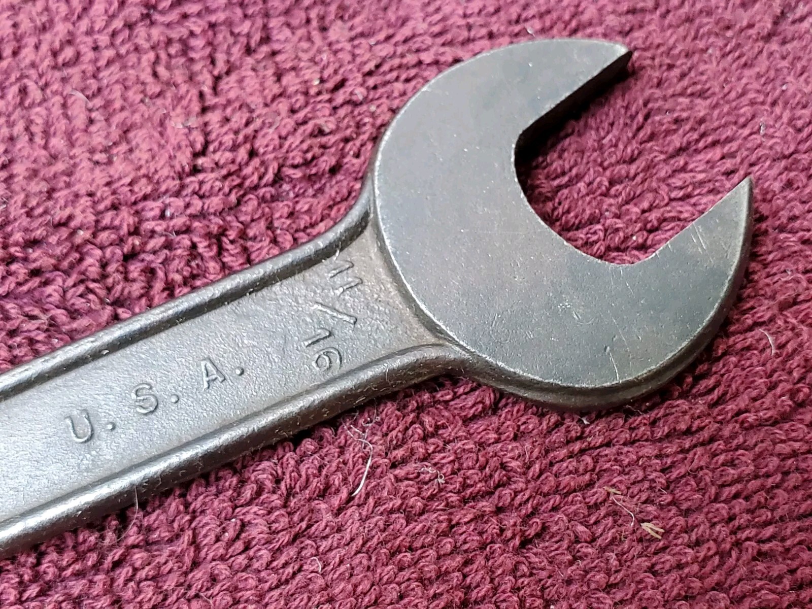 Unmarked 11/16″ by 19/32″ or 15 mm by 18 mm Open End Wrench