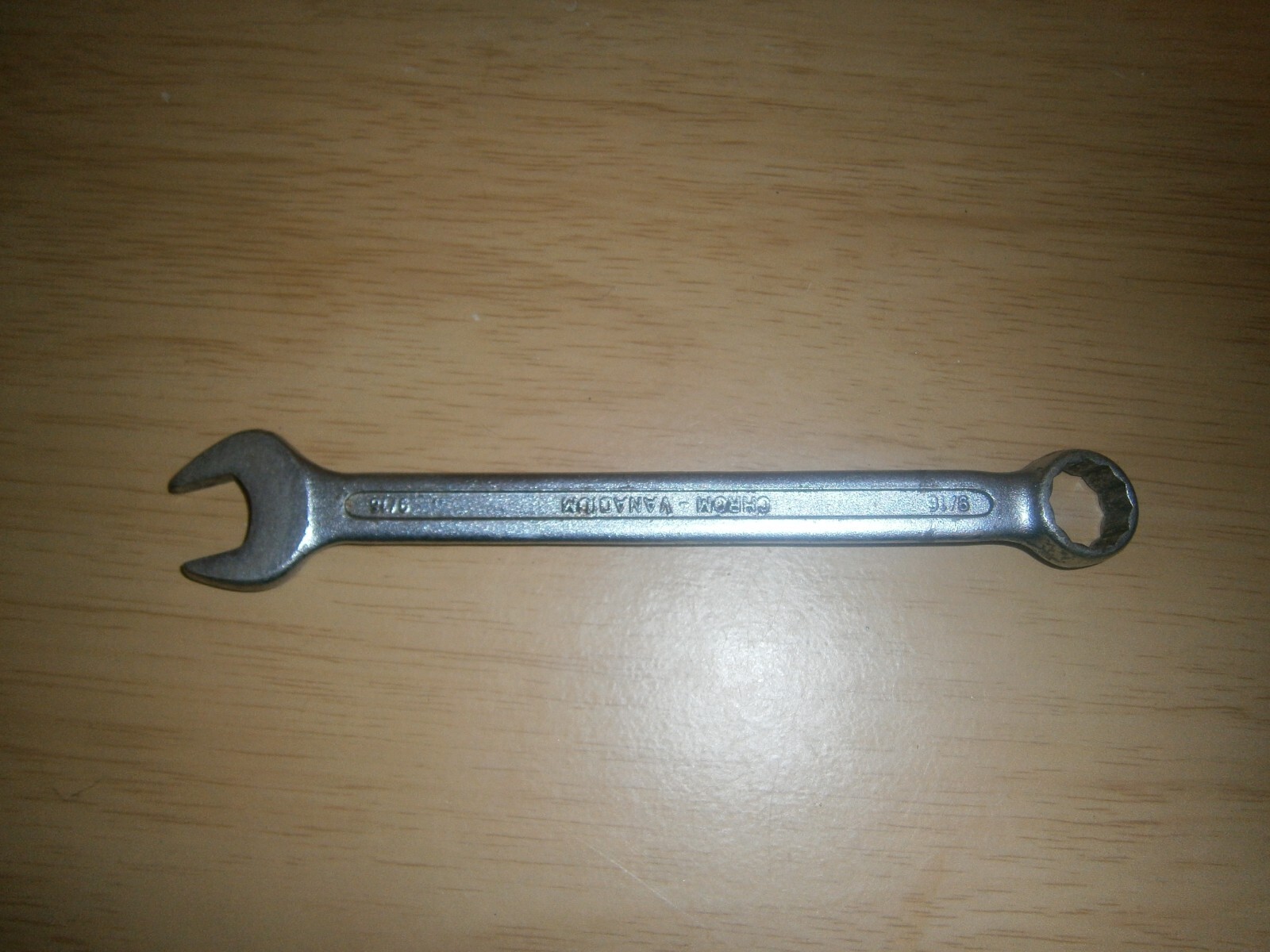 Vintage silver tone spanner. 9/16 both ends.(E6c)