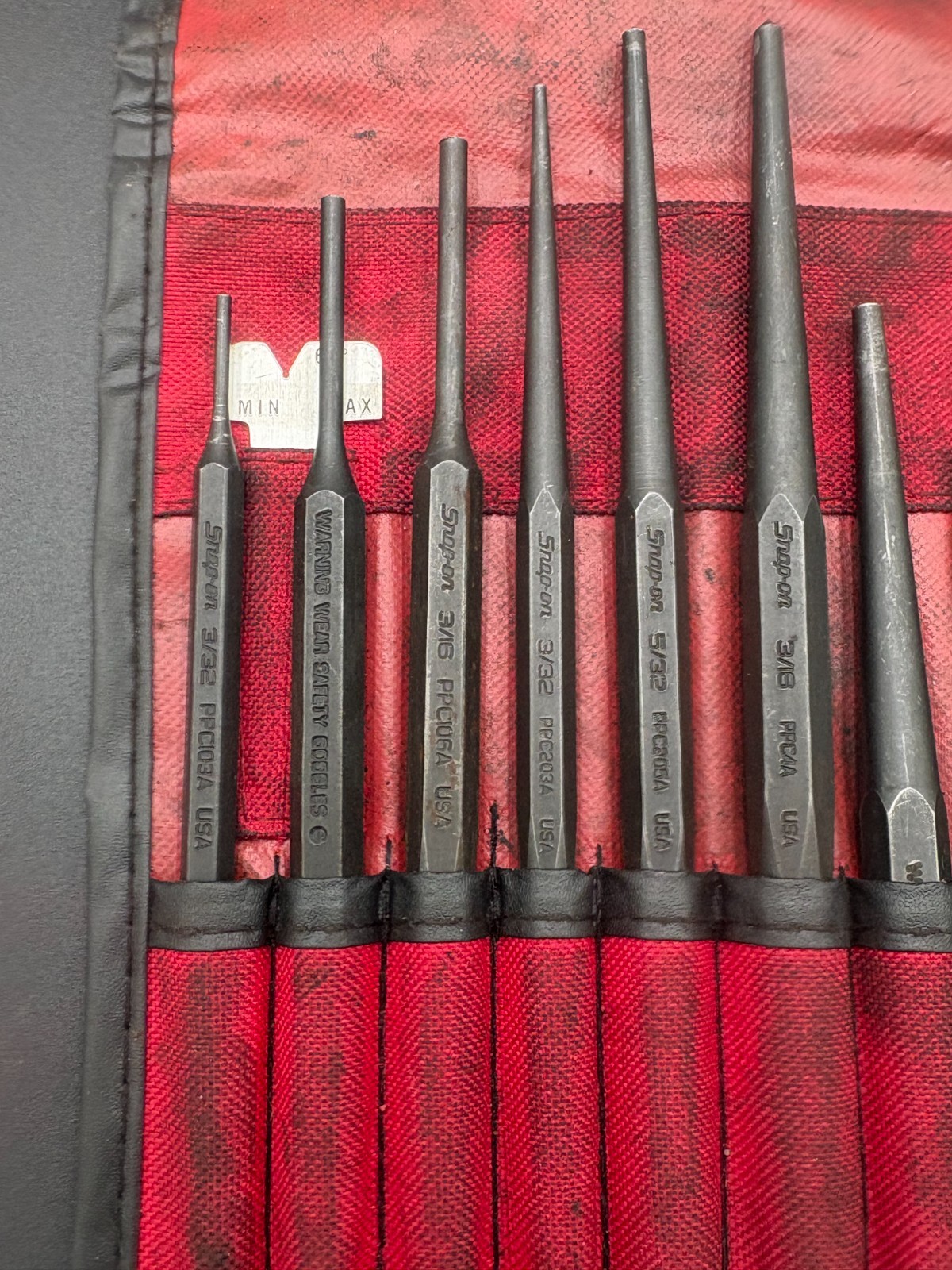 snap on 11pc punch and chisel set in soft roll case (some wear)