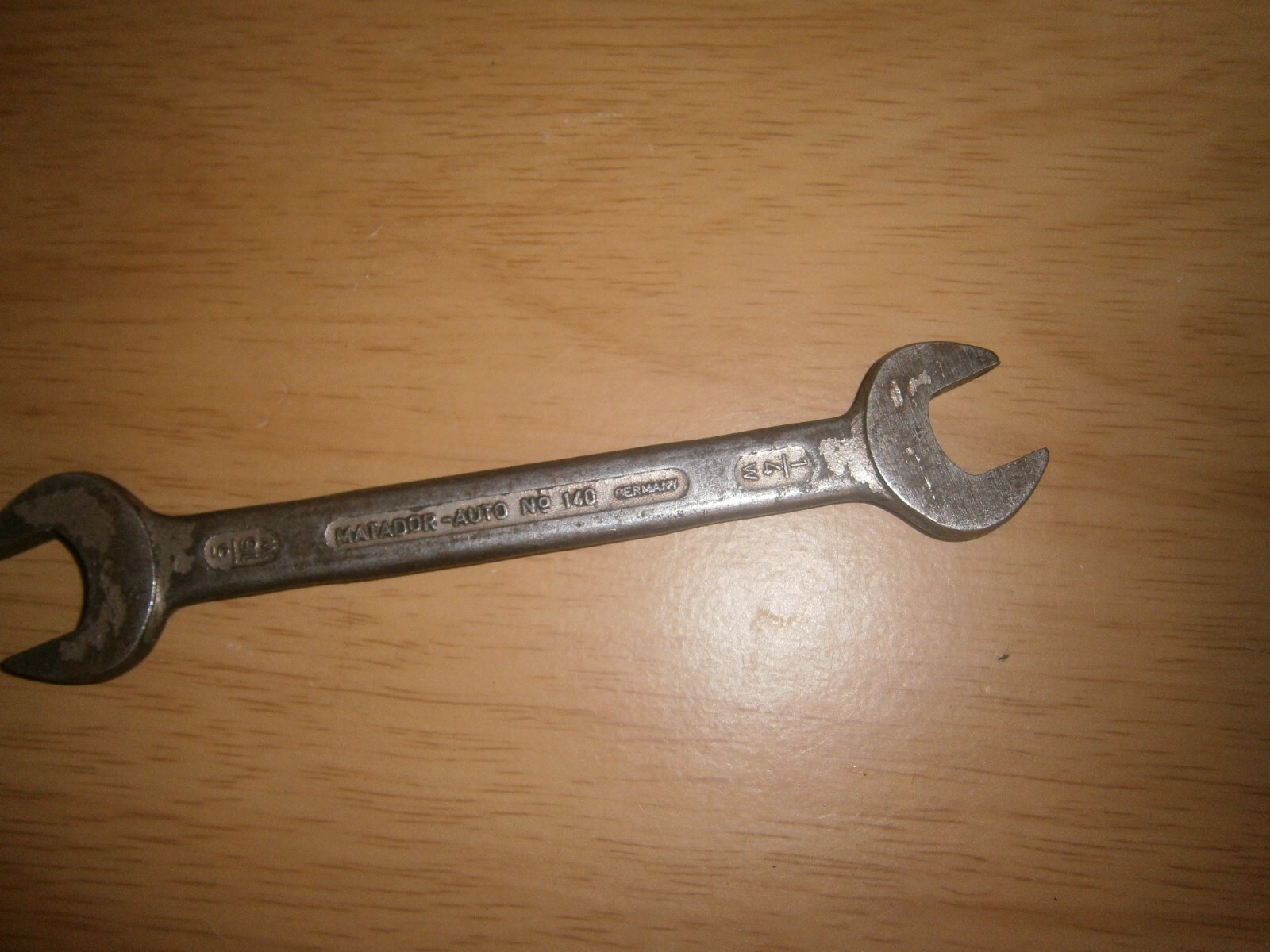 Vintage silver tone spanner. 5/16 & 1/4 W ends.(E6c)